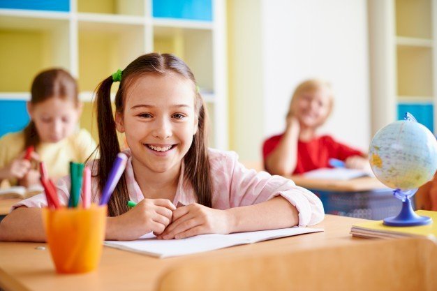 A student in a classroom. Photo: Freepik