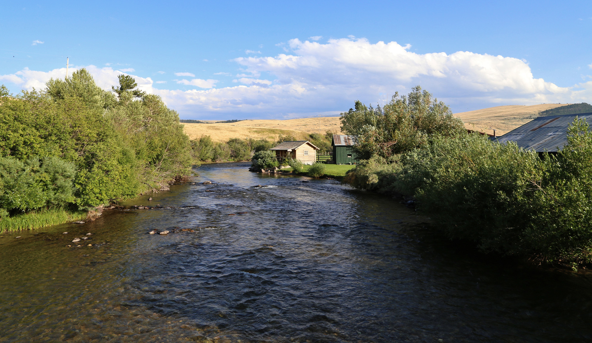 A river runs through the Montana ranch on August 16, 2014, where Tom Brokaw and Meredith Auld spend their summers and much of the fall bird-hunting season | Source: Getty Images