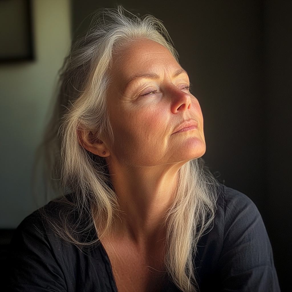 A pensive older woman | Source: Midjourney