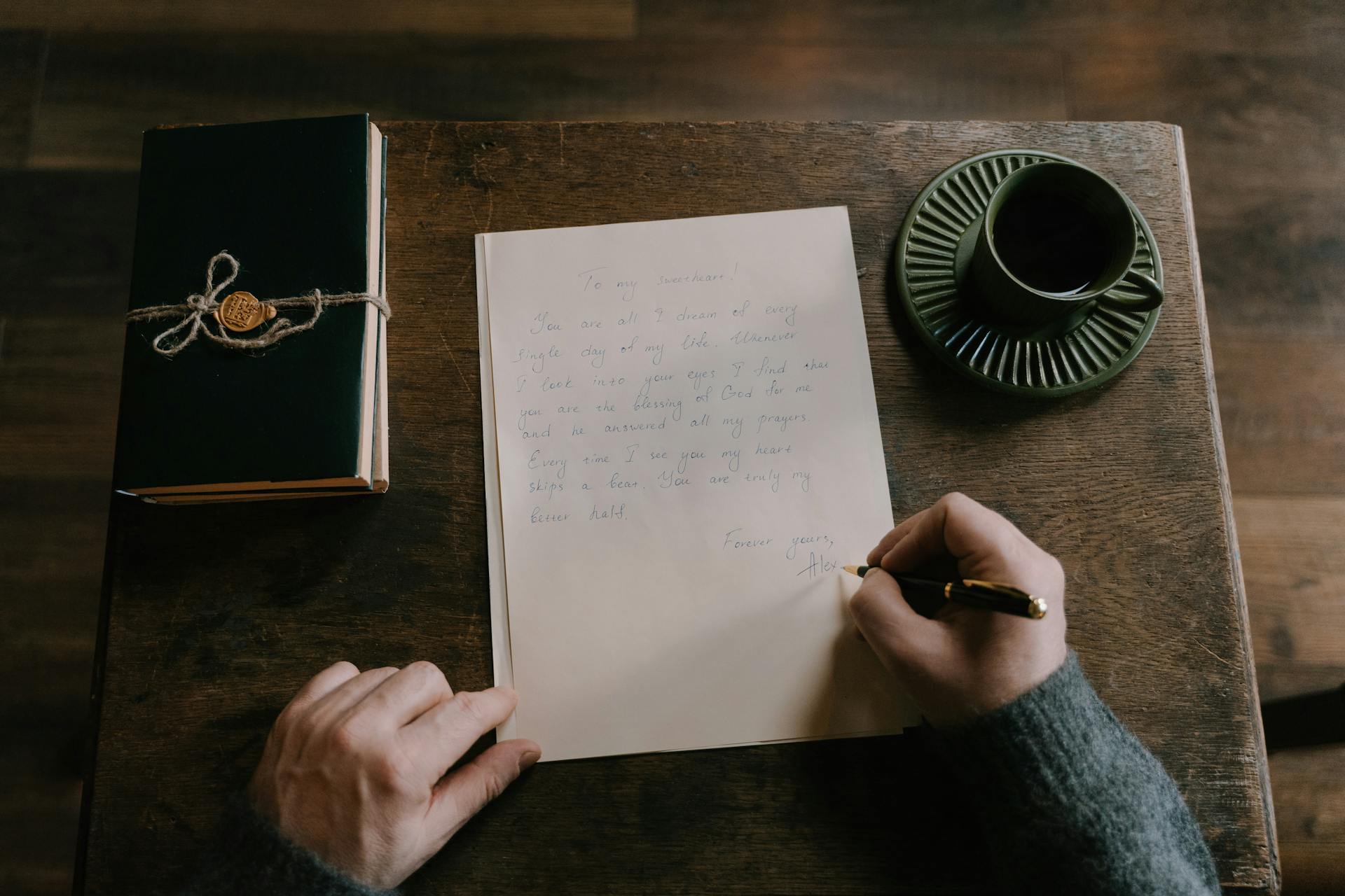 A person writing a letter | Source: Pexels