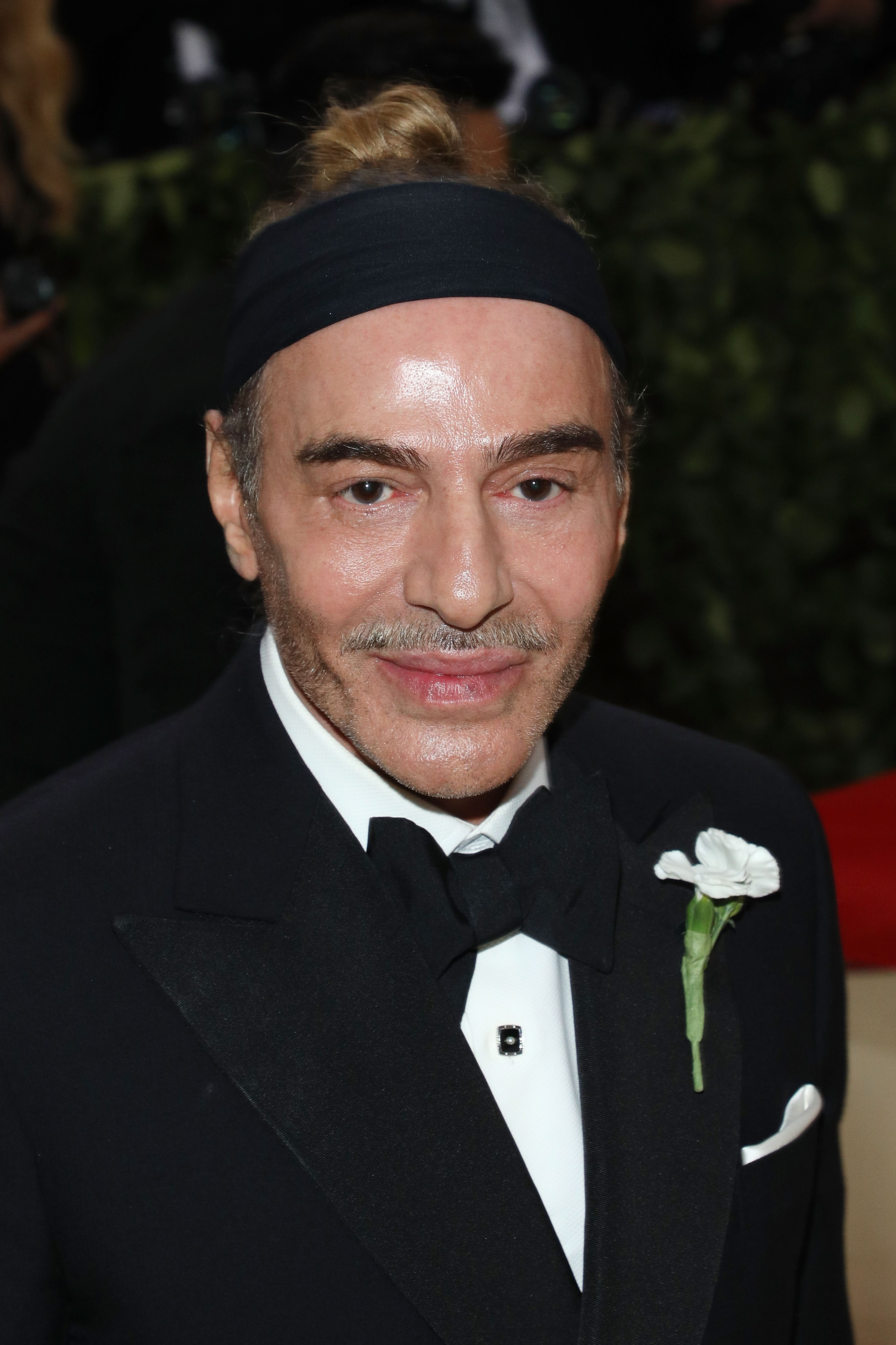 John Galliano attends "Heavenly Bodies: Fashion & the Catholic Imagination," the 2018 Costume Institute Benefit at Metropolitan Museum of Art on May 7 in New York City. | Source: Getty Images