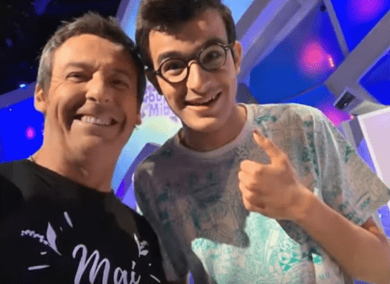 Jean-Luc Reichmann et Paul sur le plateau des "12 coups de midi". | Youtube/Nouvelles Générales