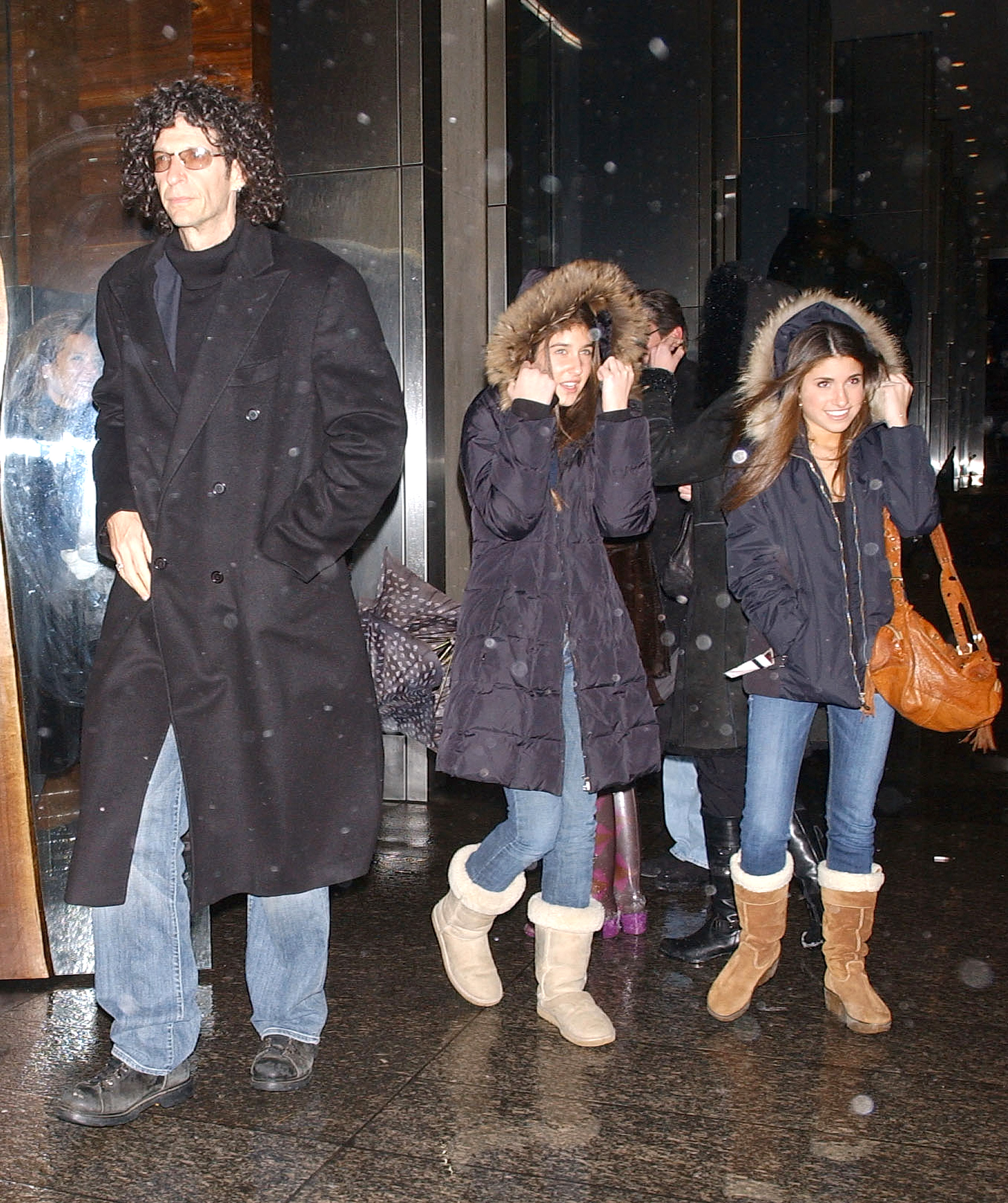 Howard Stern with his daughters Ashley and Debra Stern leaves a midtown restaurant on March 16, 2007, in New York City | Source: Getty Images