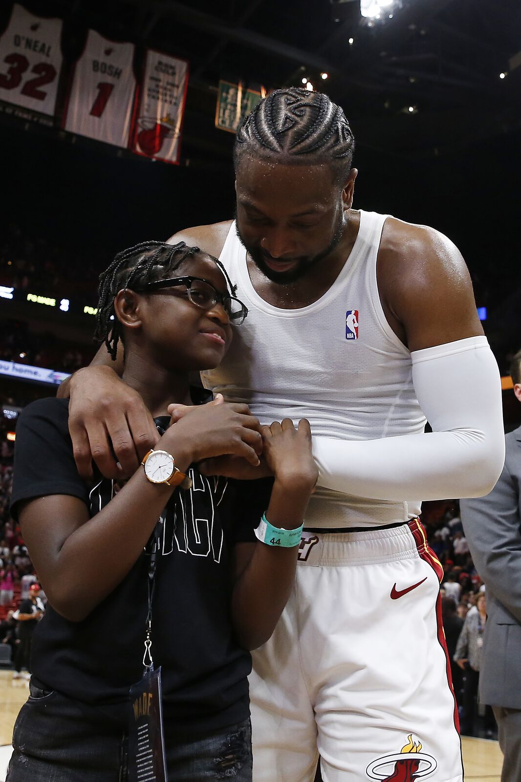 Dwyane Wade hugs daughter Zaya Wade at American Airlines Arena on April 09, 2019, in Miami, Florida | Photo: Michael Reaves/Getty Images