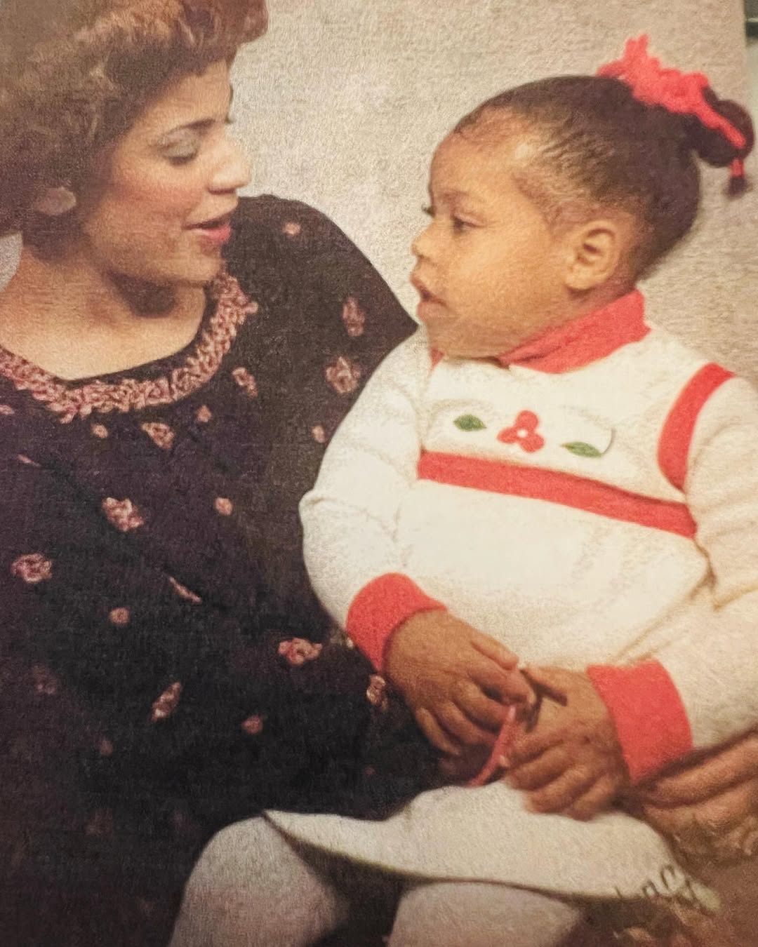 A young Sheinelle Jones and her mother, from a post dated July 22, 2024. | Source: Instagram/sheinelle_o