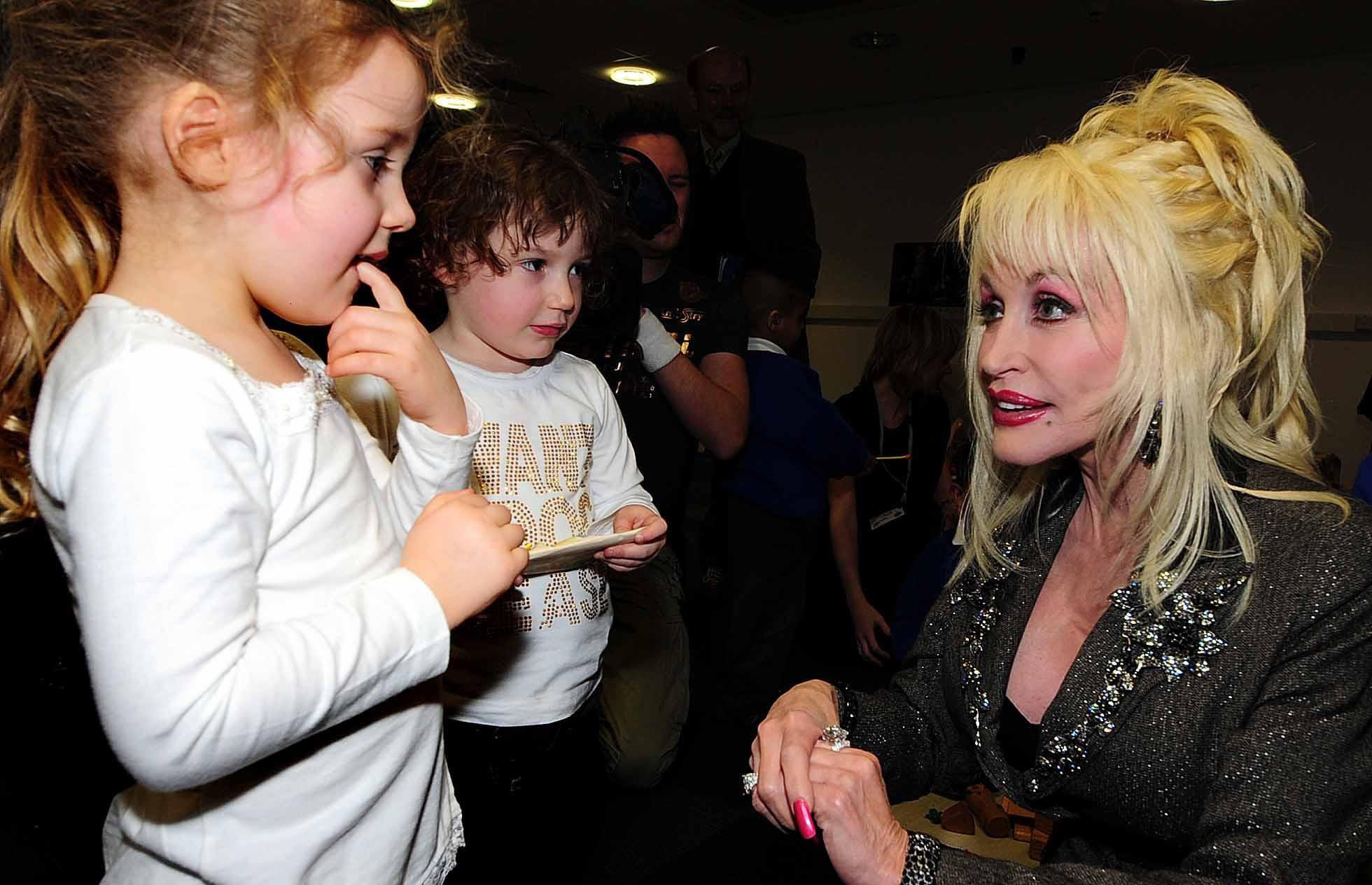 Dolly Parton launches the Imagination Library, her children's literacy scheme, at the Magna Science Adventure Centre in Rotherham, South Yorkshire, on December 5, 2007. | Source: Getty Images