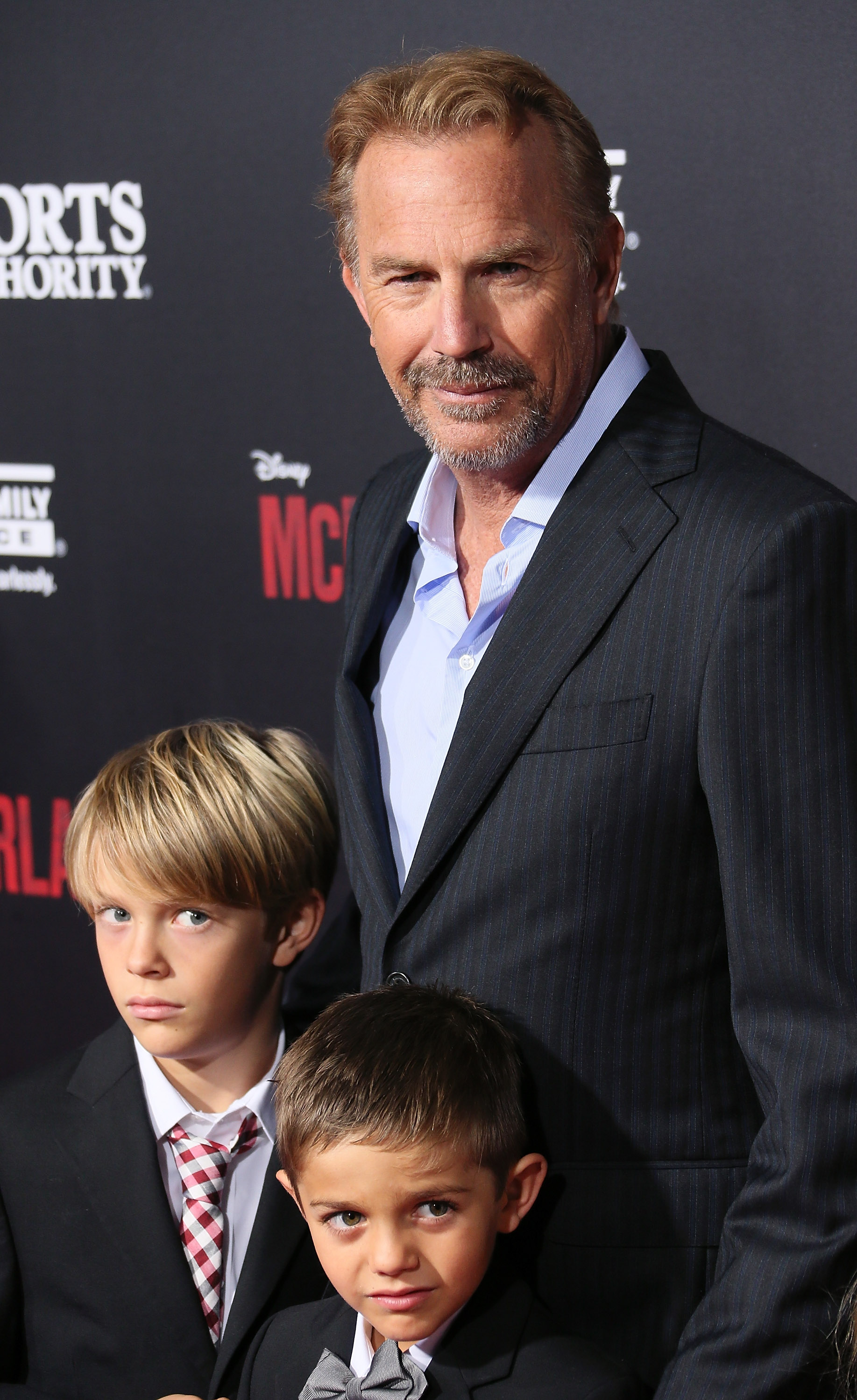 Kevin Costner and his sons at the premiere of "McFarland, USA" at the El Capitan Theatre on February 9, 2015, in Hollywood, California | Source: Getty Images