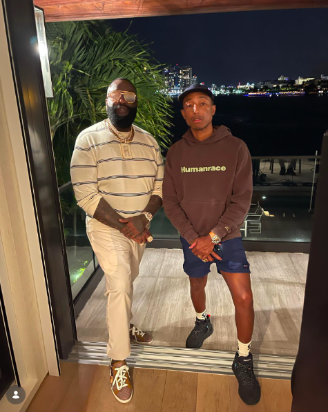 Rick Ross posing for a photo with Pharrell, posted on April 28, 2021. | Source: Instagram/richforever