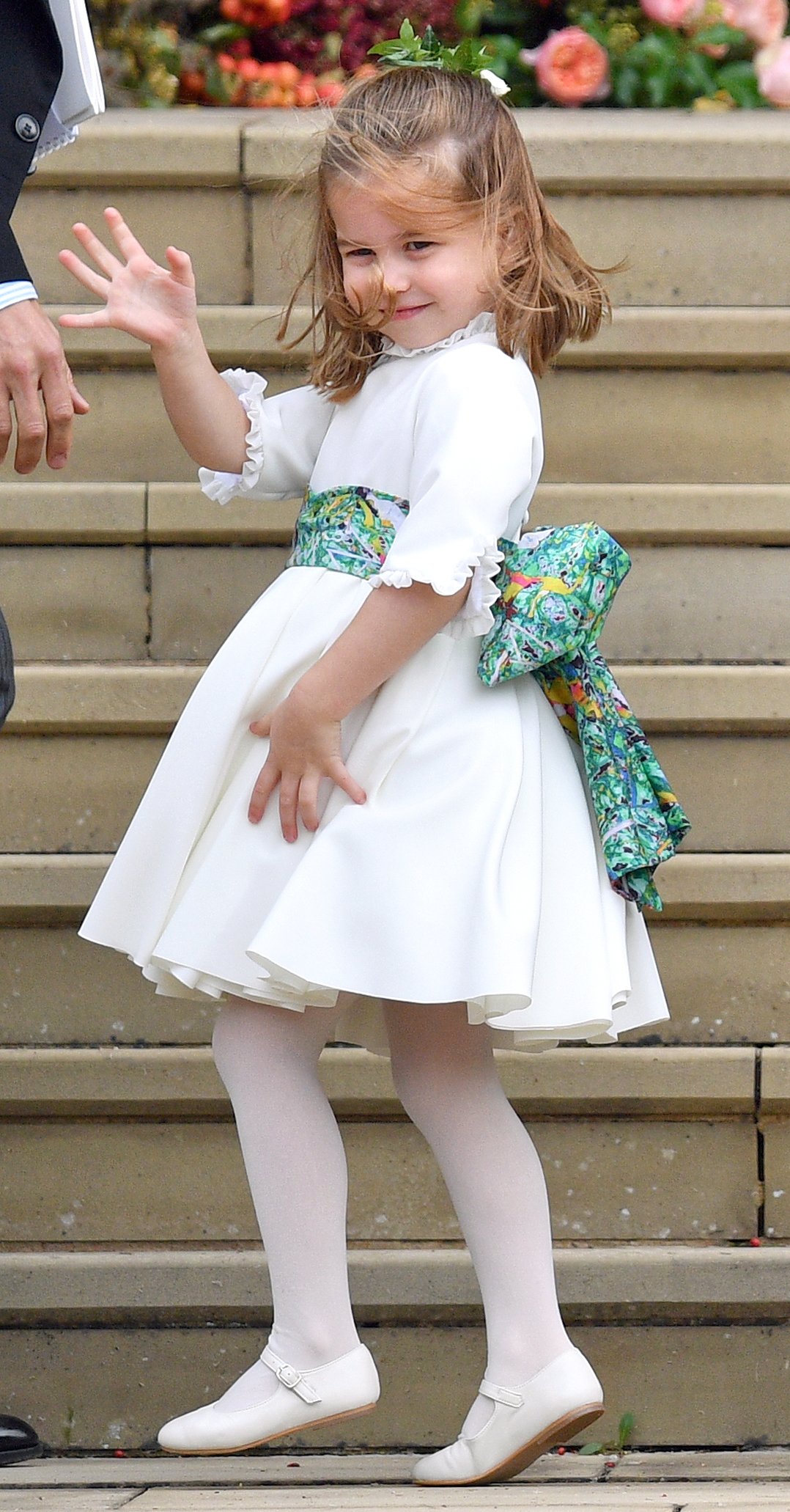 Princess Charlotte outside St. George's Chapel at Princess Eugenie's wedding to Jack Brooksbank | Photo: Getty Images