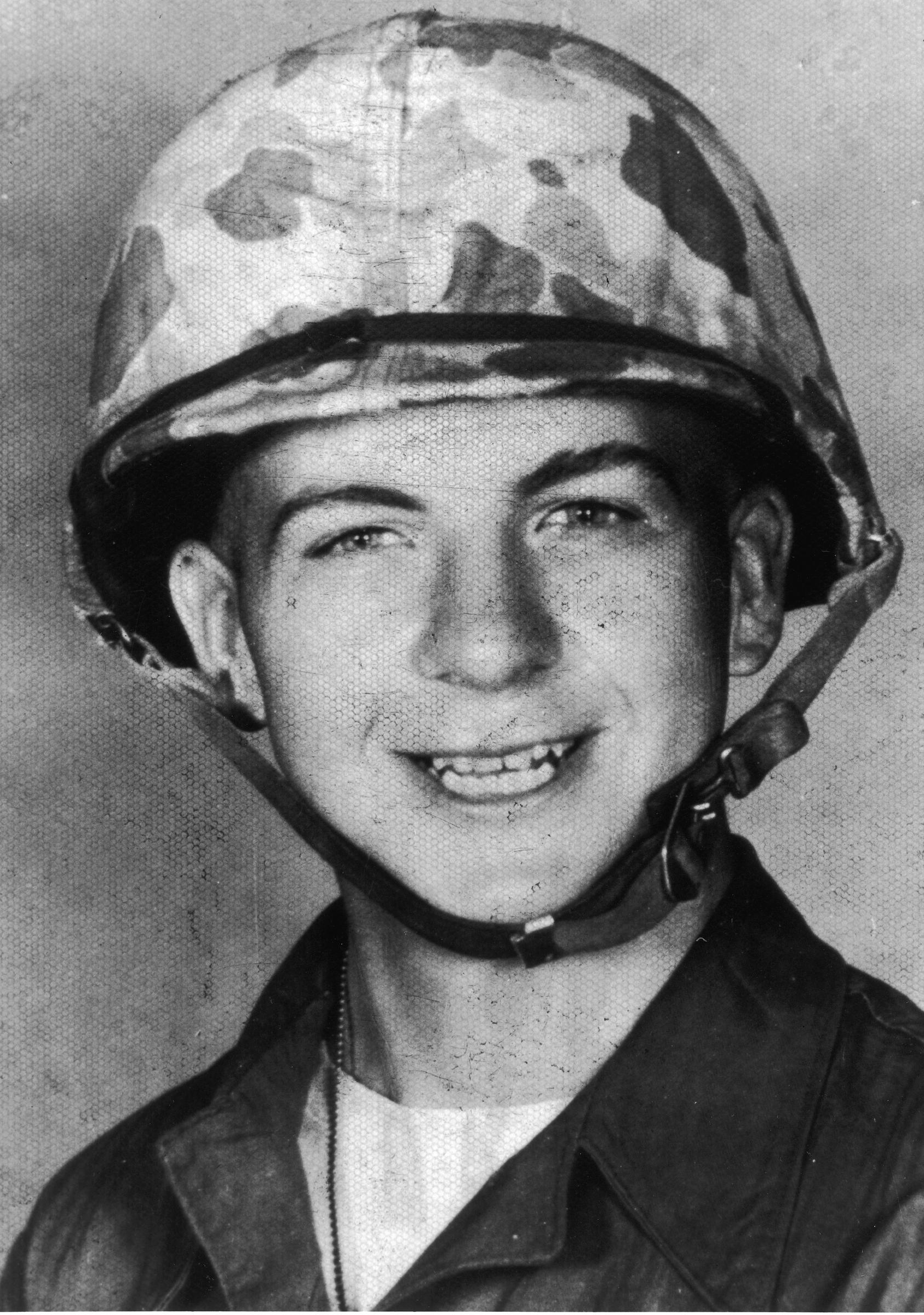 Lee Harvey Oswald wearing an army helmet, circa 1960s | Source: Getty Images