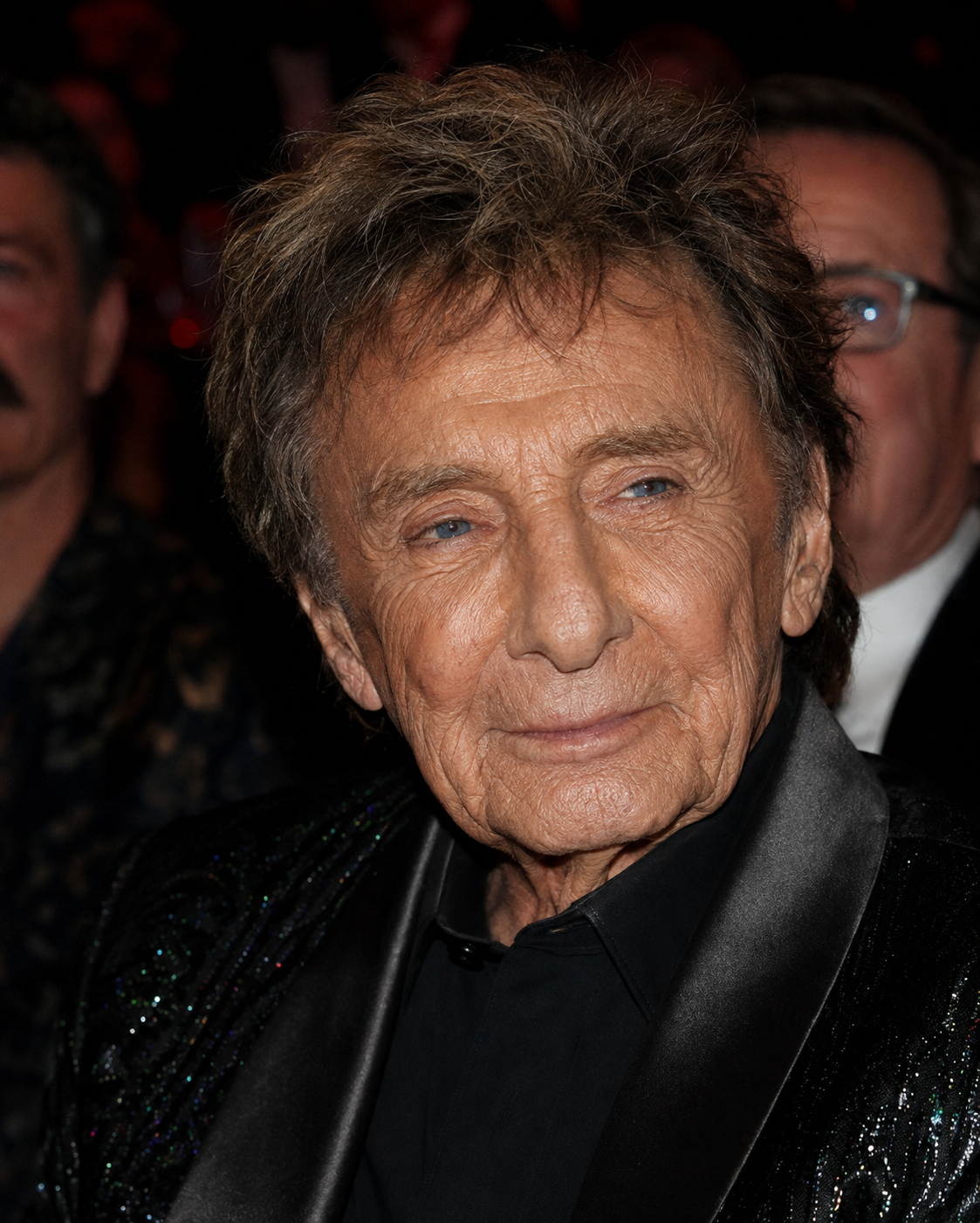 The close framing makes Manilow's expression the main focus. With fewer background details, the image feels more direct and makes the imagined aging easier to notice at a glance. | Source: ChatGPT