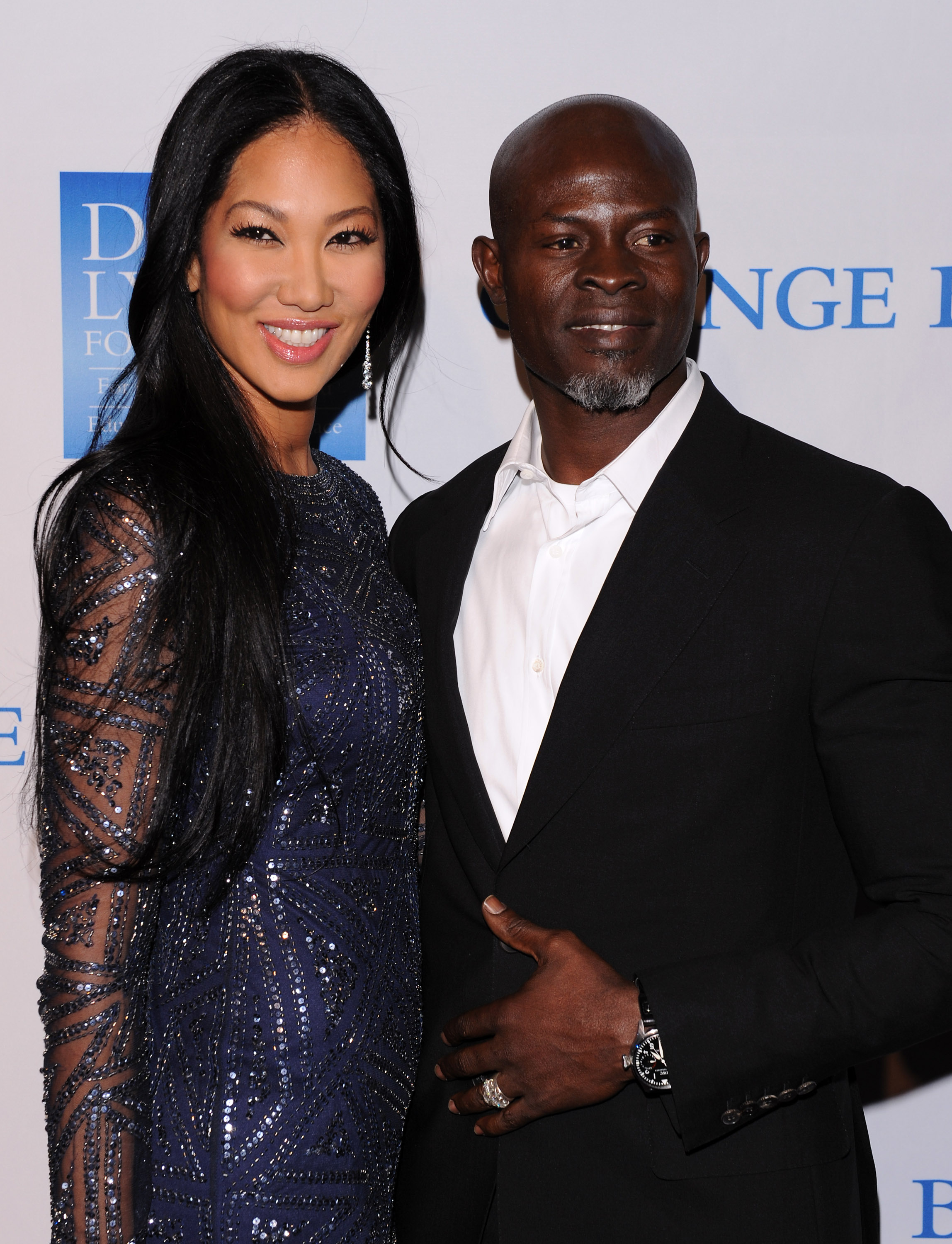 Kimora Lee Simmons and Djimon Hounso at the 3rd Annual "Change Begins Within" Benefit Celebration on December 3, 2011, in Los Angeles, California | Source: Getty Images