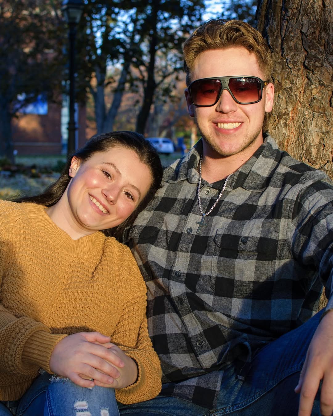 Aidan Dorgan and his fiancée, Starr, pose together outdoors in a personal photograph | Source: Instagram/adawg_18