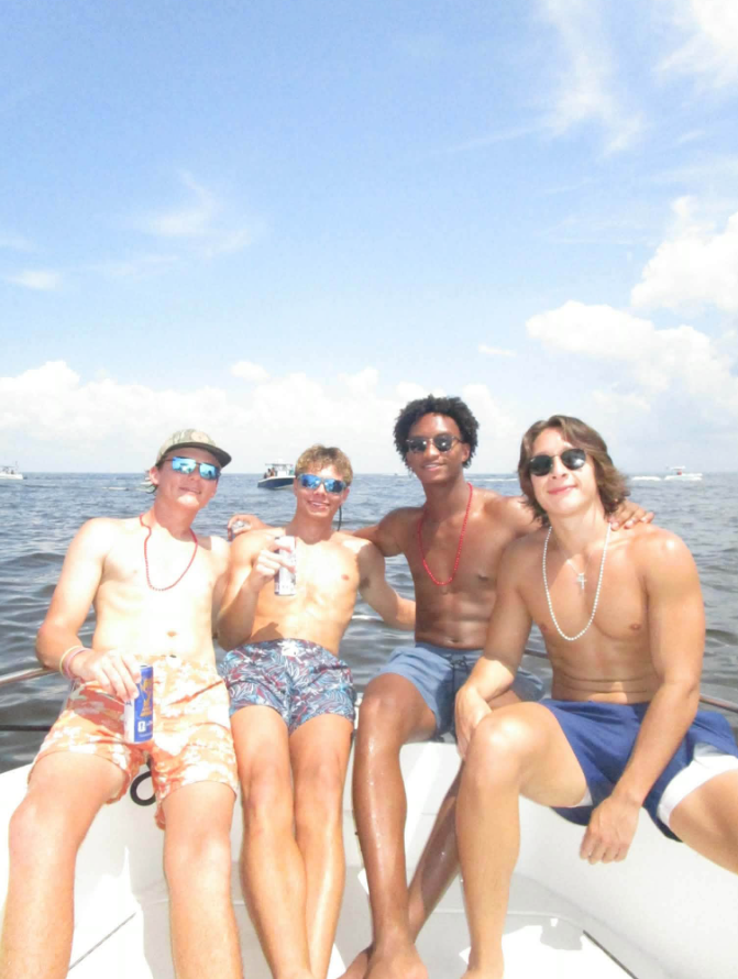 This photo shows Nolan Wells with friends during the Fourth of July outing to Horn Island, the trip that would end in tragedy. According to investigators, Wells remained on the island after his friends returned to the mainland, a decision that has become a central focus of the ongoing investigation. | Source: Facebook/christine.wonsley