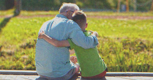 An old man hugging a kid | Source: Shutterstock
