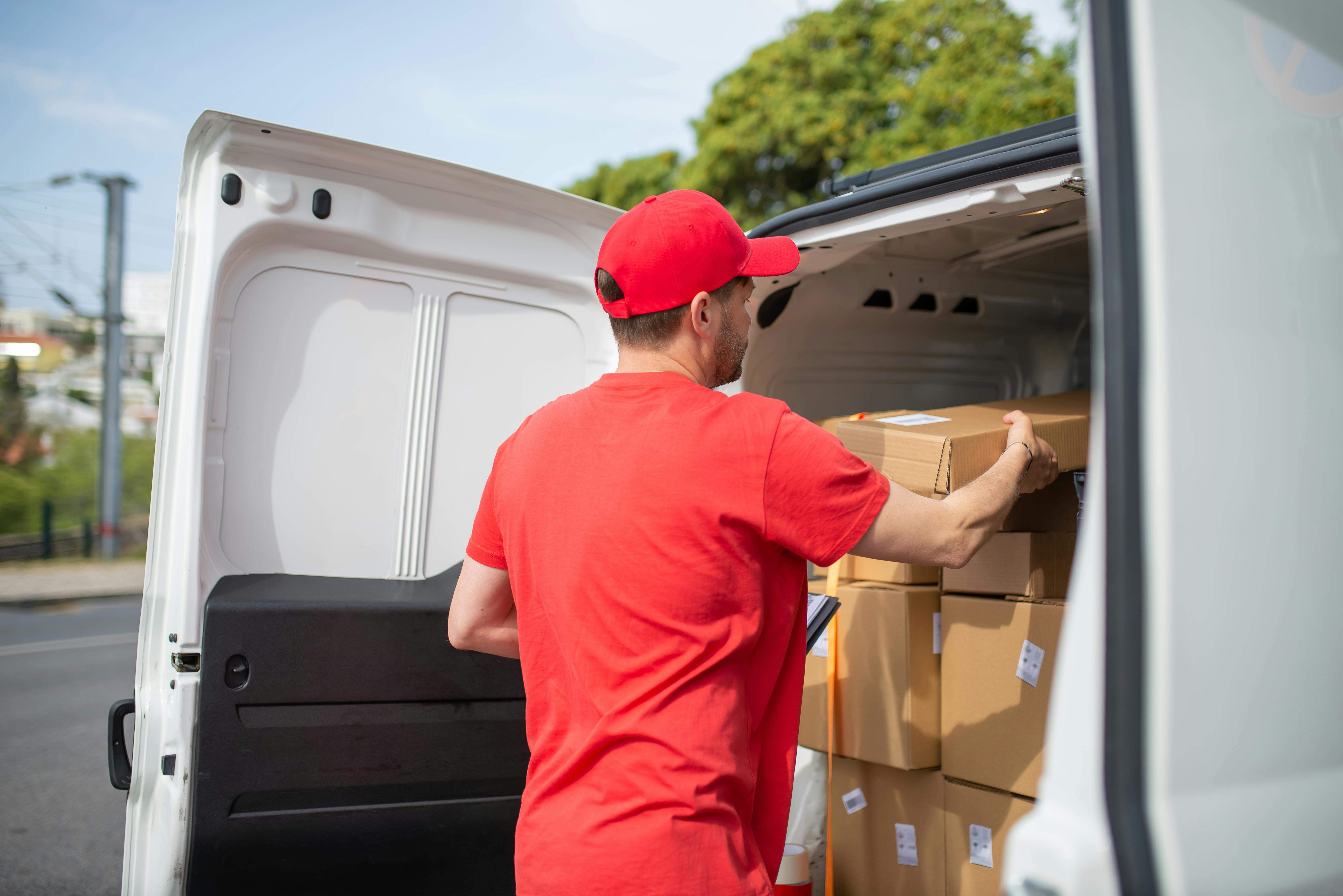 Courier delivers a package | Source: Pexels