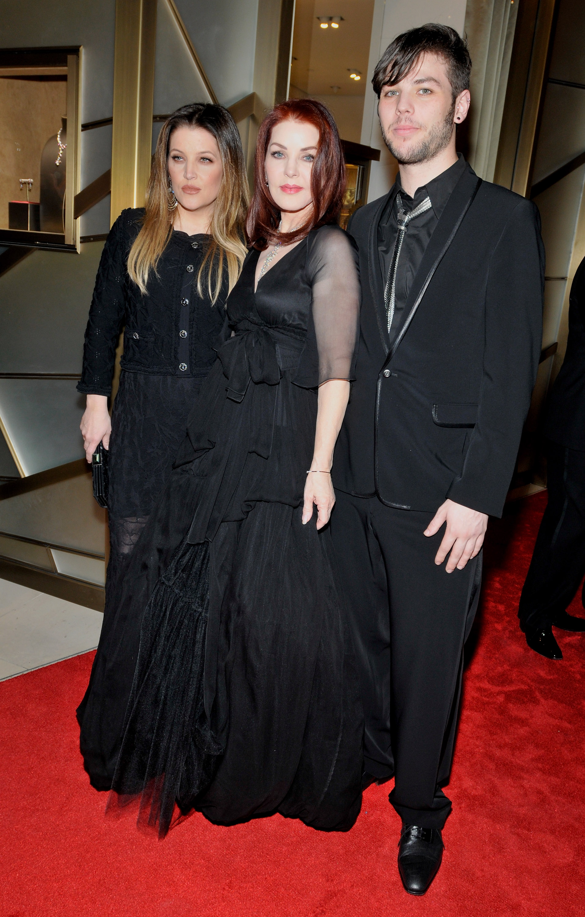 (L-R) Lisa Marie Presley, Priscilla Presley and Navarone Garibaldi Garcia attend at a cocktail reception at CityCenter on January 29, 2011 in Las Vegas, Nevada.| Source: Getty Images
