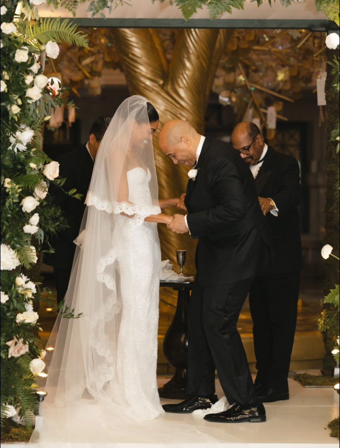 Two officiating officials joined Cory Booker and Alexis Lewis in marriage, as seen from a post dated November 30, 2025. | Source: Facebook/CoryBooker