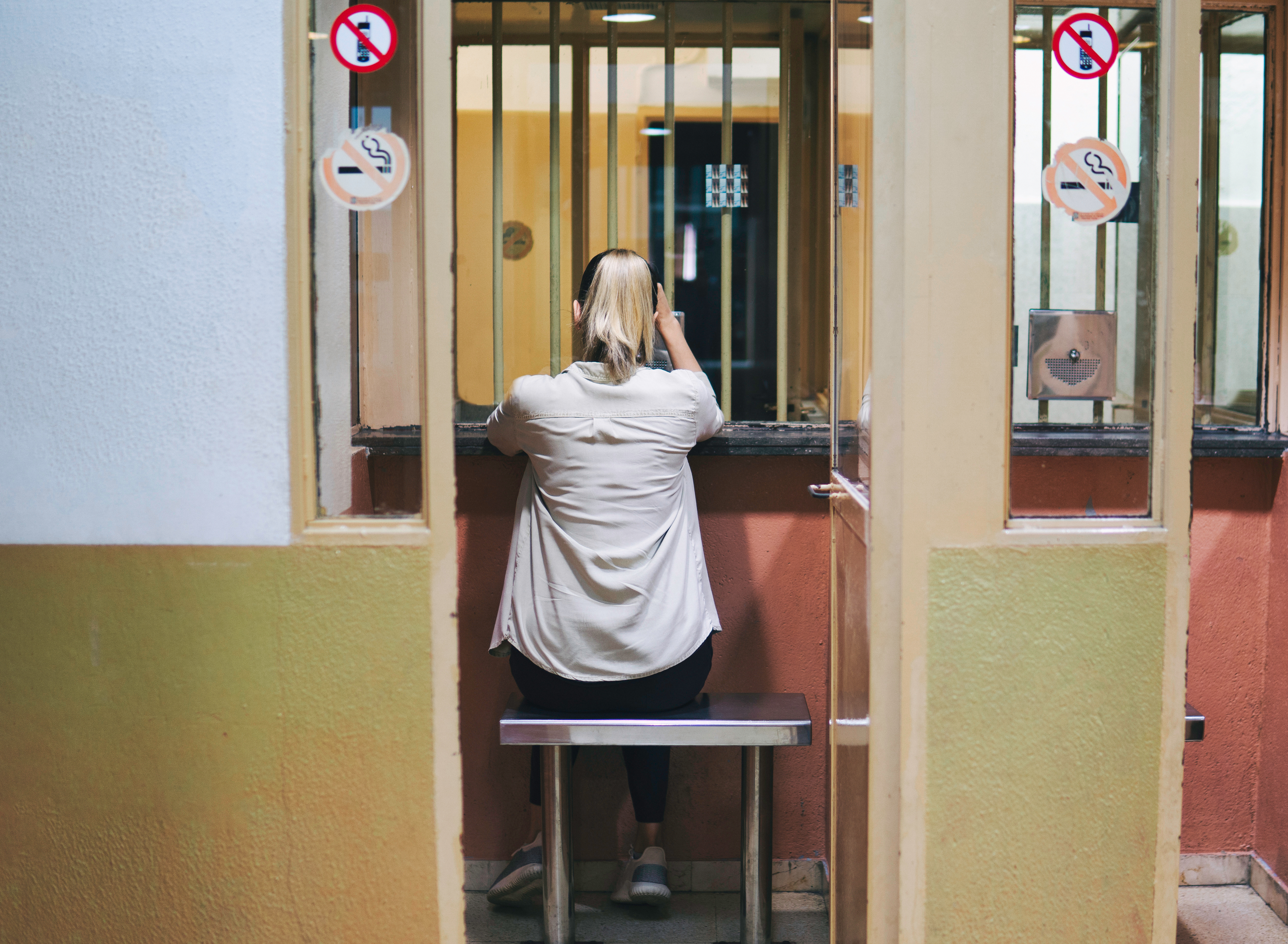 Young girl or woman looking forward to meeting a prisoner. | Source: Shutterstock