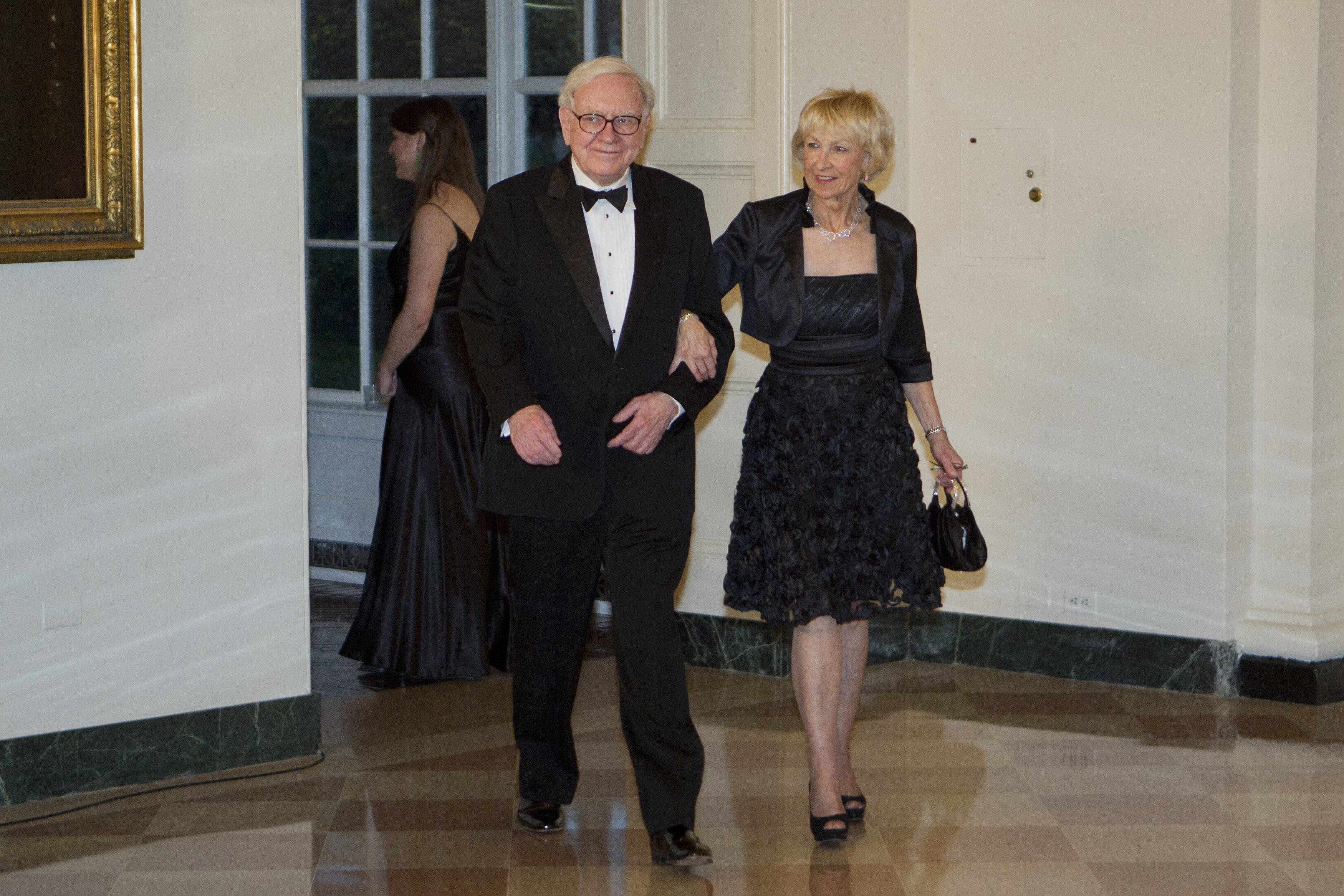 Warren and Astrid Buffett arrive to a state dinner at the White House in Washington, D.C., on March 14, 2012. | Source: Getty Images