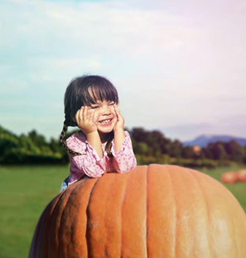 As an only child, Olivia Rodrigo had a close relationship with her parents. She can be seen in this photo posing with a pumpkin shared on a video for Asian Pacific Heritage Month on May 15, 2017. | Source: Youtube/Disney Channel