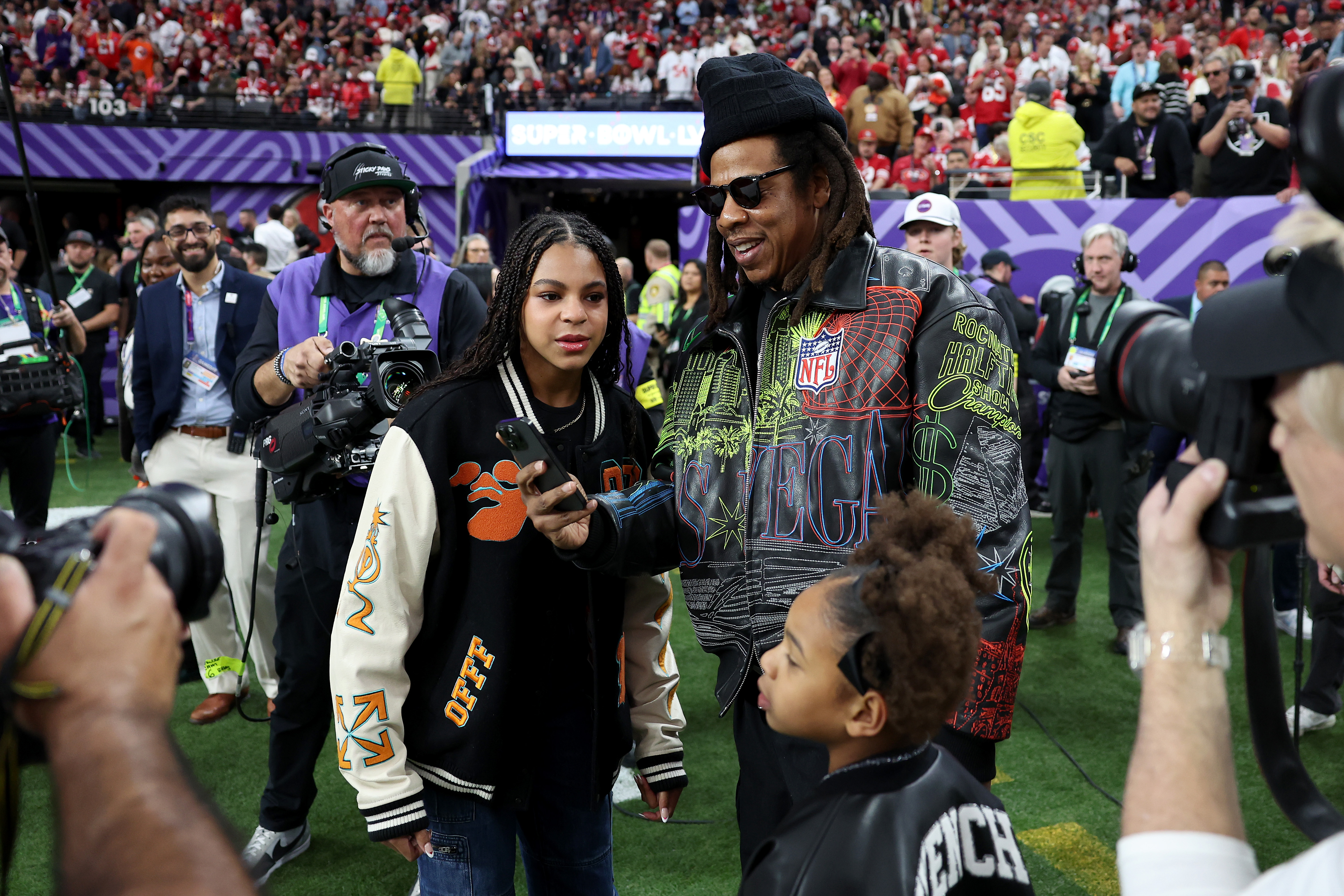 Jay-Z with daughters Blue Ivy and Rumi Carter before Super Bowl LVIII between the against the San Francisco 49ers and Kansas City Chiefs on February 11, 2024 in Las Vegas, Nevada | Source: Getty Images