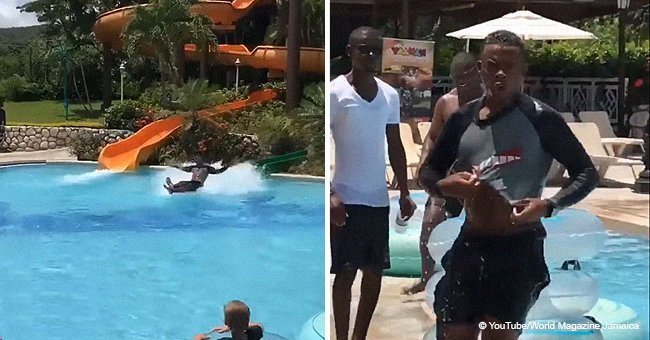 Disconcerting video of a man shooting out of a waterslide and walking away	