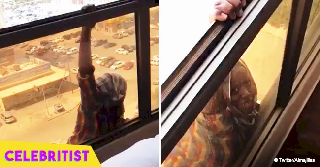 Woman jailed after filming her housemaid hanging out of seventh-floor balcony