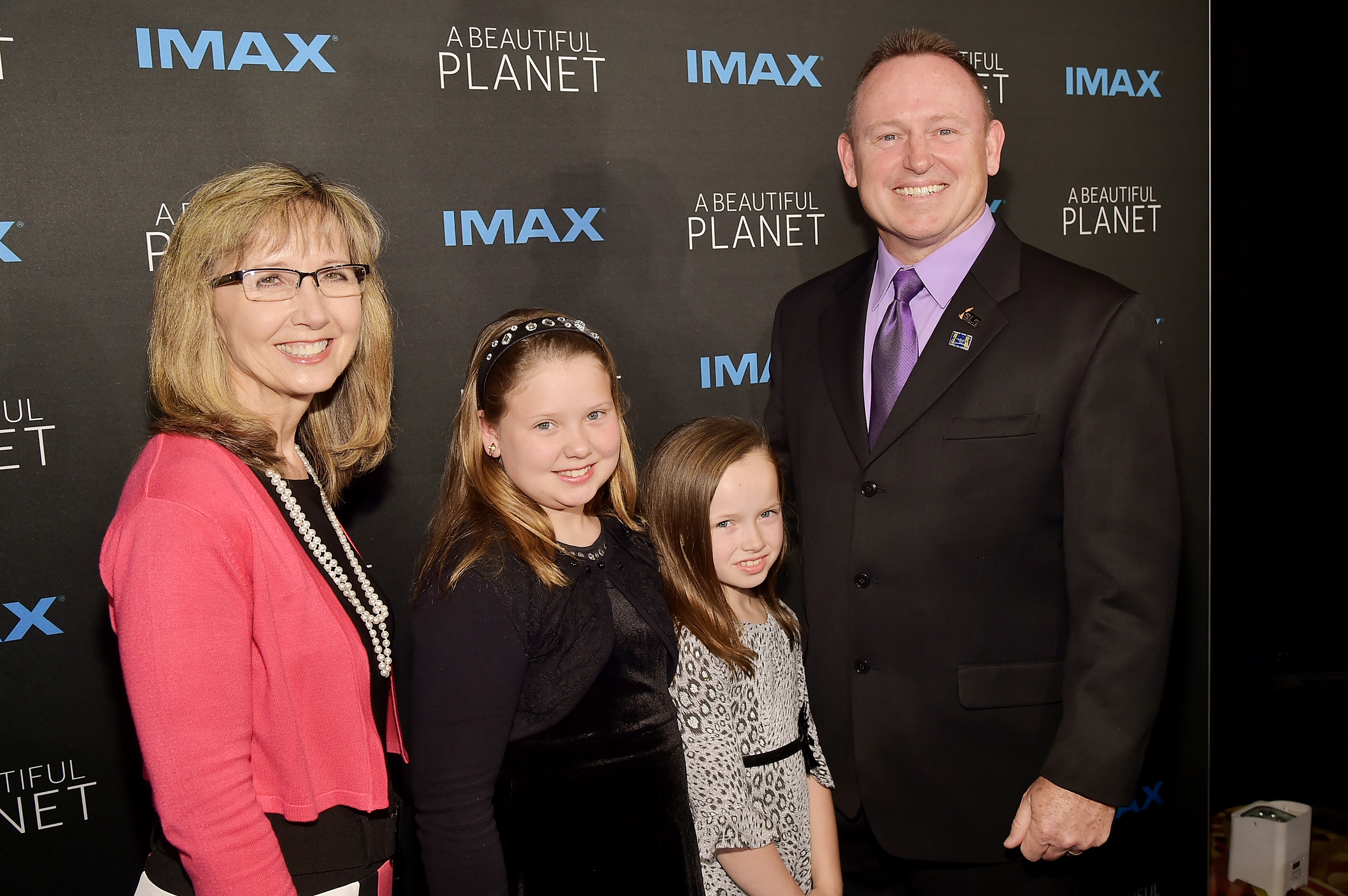 Barry "Butch" E. Wilmore (R) and his family attend the premiere of "A Beautiful Planet" at AMC Loews Lincoln Square in New York City, on April 16, 2016 | Source: Getty Images