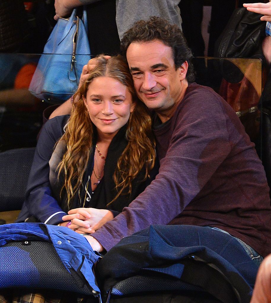 Mary-Kate Olsen and Olivier Sarkozy at a basketball game at Madison Square Garden on November 9, 2012. | Photo: Getty Images