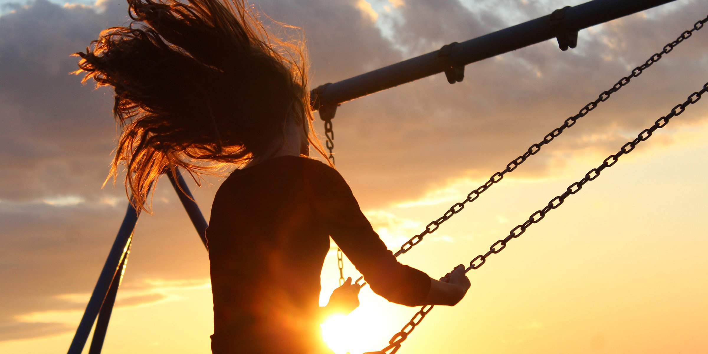 A woman swinging | Source: Unsplash