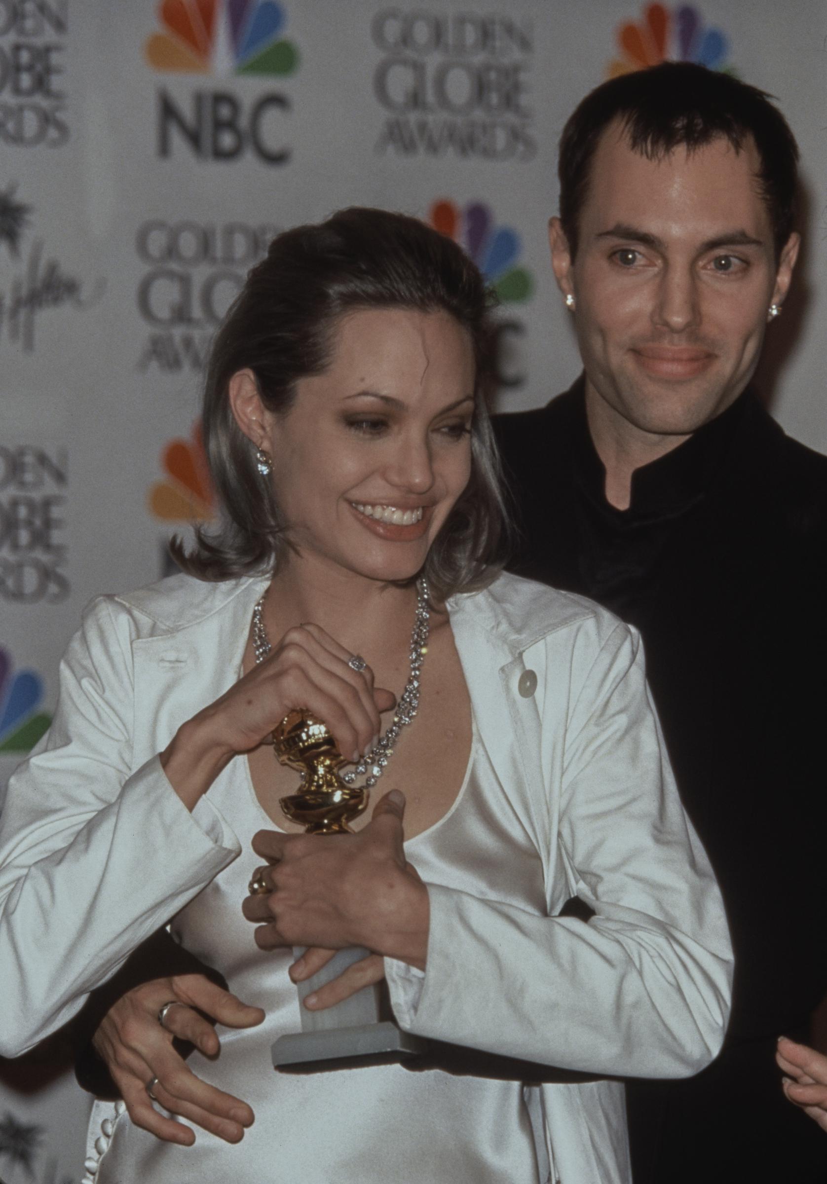 Angelina Jolie and James Haven at the 57th annual Golden Globe Awards on January 24, 2000, in Beverly Hills, California. | Source: Getty Images