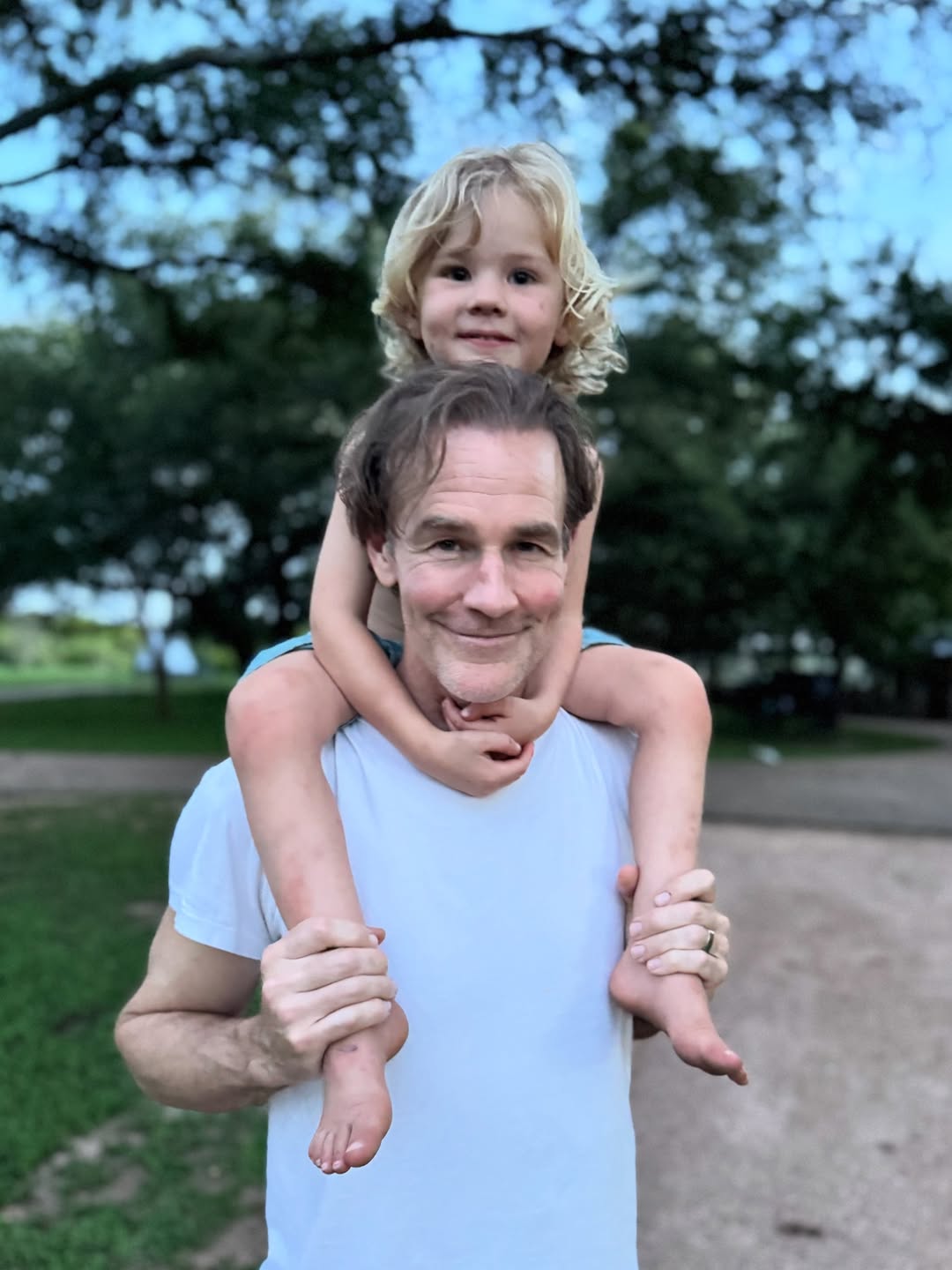 James Van Der Beek posing for a photo with his son on his shoulders, posted on October 11, 2025. | Source: Instagram/vanderjames