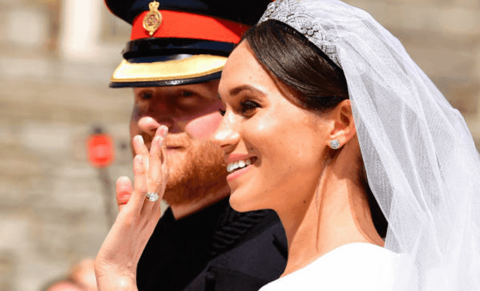  Prince Harry and Meghan Markle leave Windsor Castle in the Ascot Landau carriage after their wedding ceremony, on May 19, 2018 in Windsor, England | Source: Getty Images (Photo by James Devaney/GC Images)