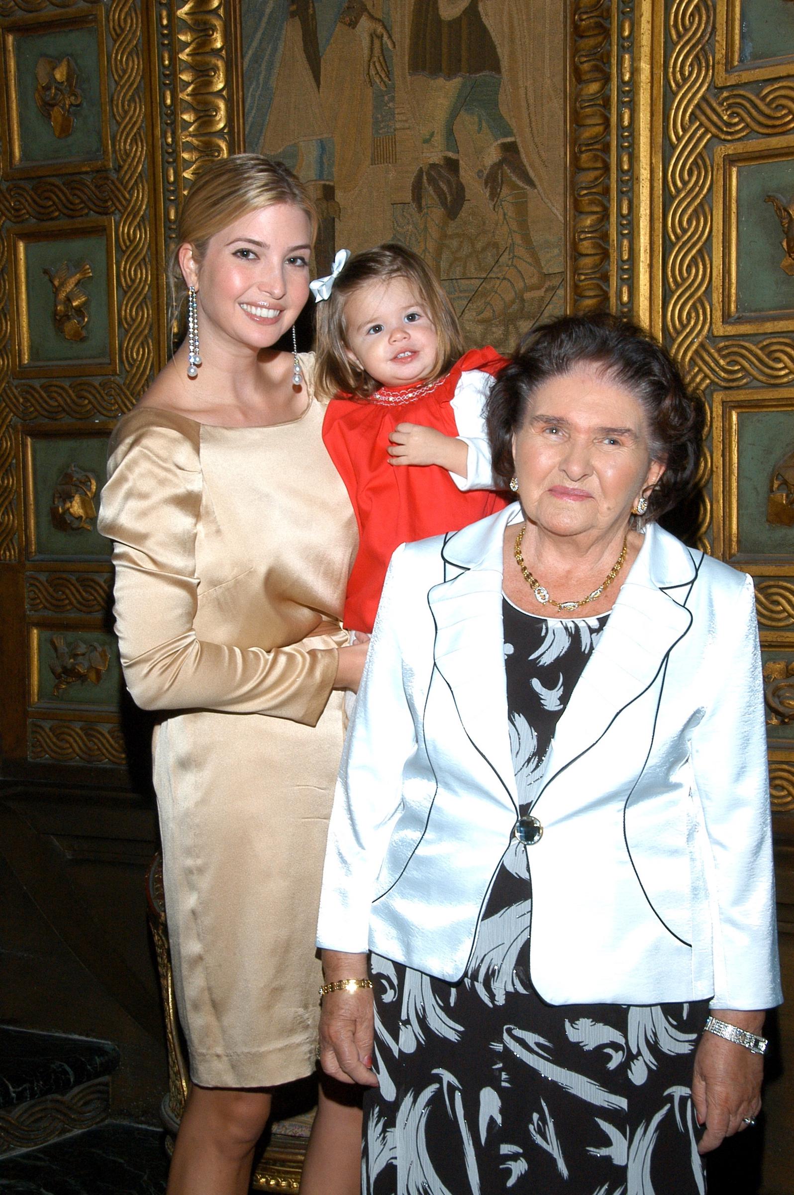 Ivanka Trump holds her niece Kai Madison while standing with her grandmother Marie Zelnickova at the Mar-A-Lago estate on Thanksgiving Day, November 27, 2008, in Palm Beach, Florida | Source: Getty Images
