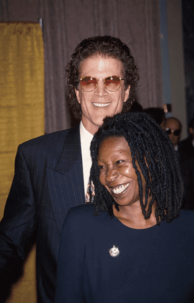 An undated image of Whoopi Goldberg standing with actor boyfriend Ted Danson at the New York Friars Club | Photo: Getty Images