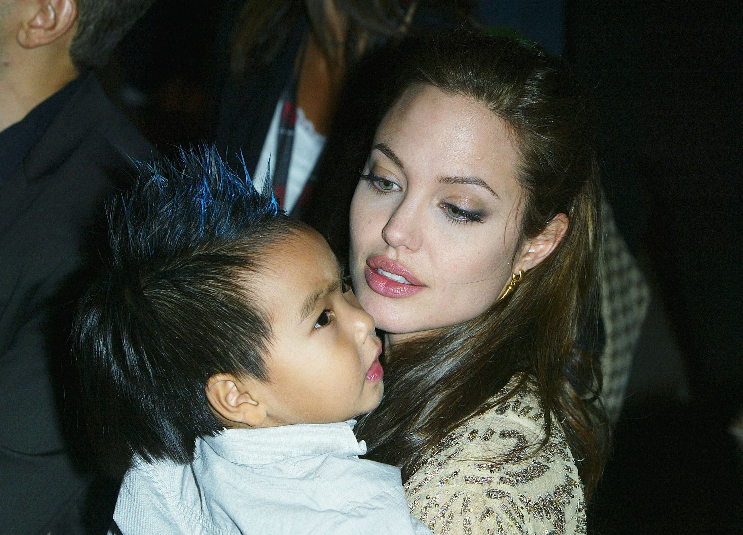 Angelina Jolie and her son Maddox at the World Premiere of "Shark Tale" in Venice in 2004 | Source: Getty Images