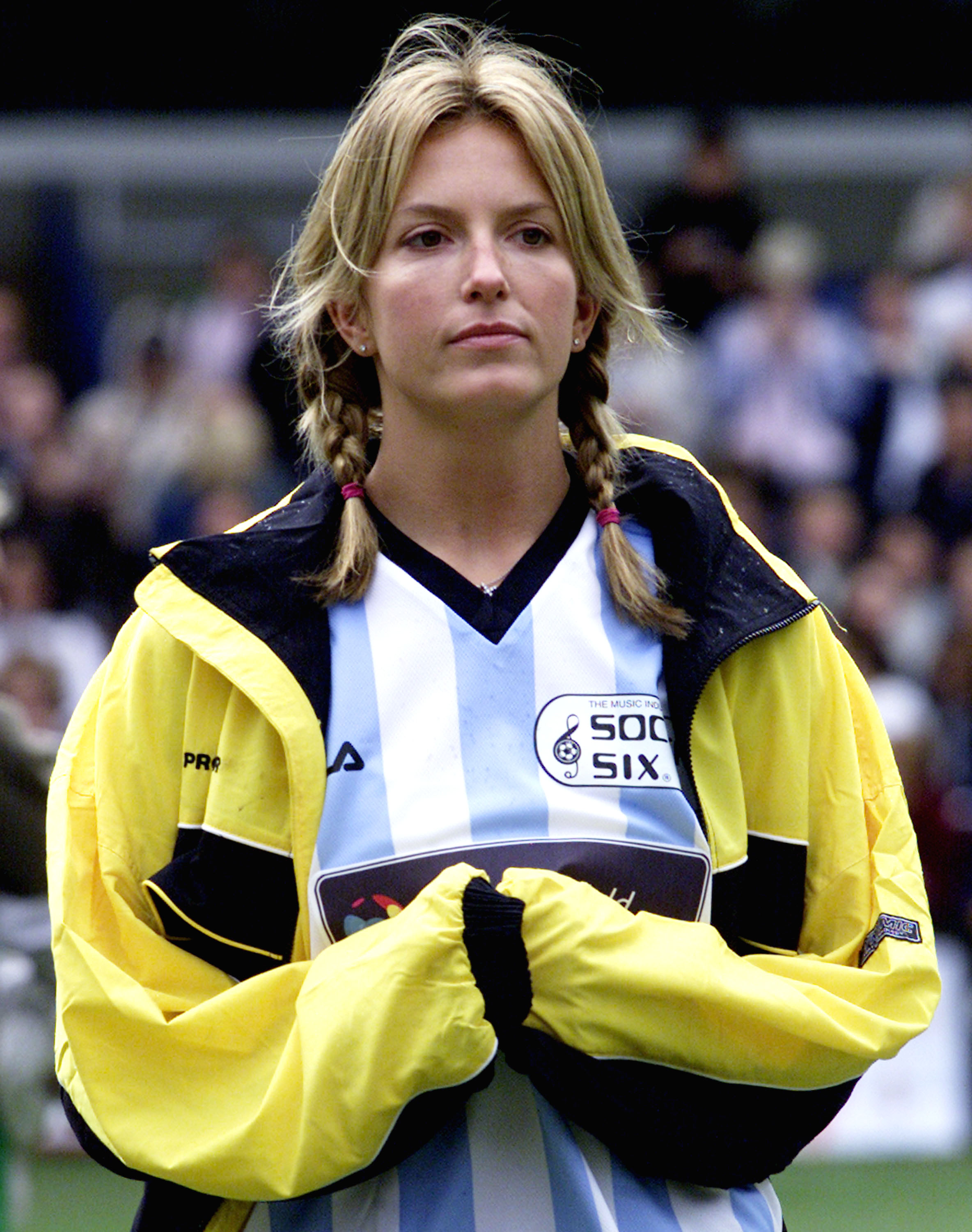 Penny Lancaster watches Rod Stewart play during the Music Industry Soccer Six games event on May 26, 2002 | Source: Getty Images