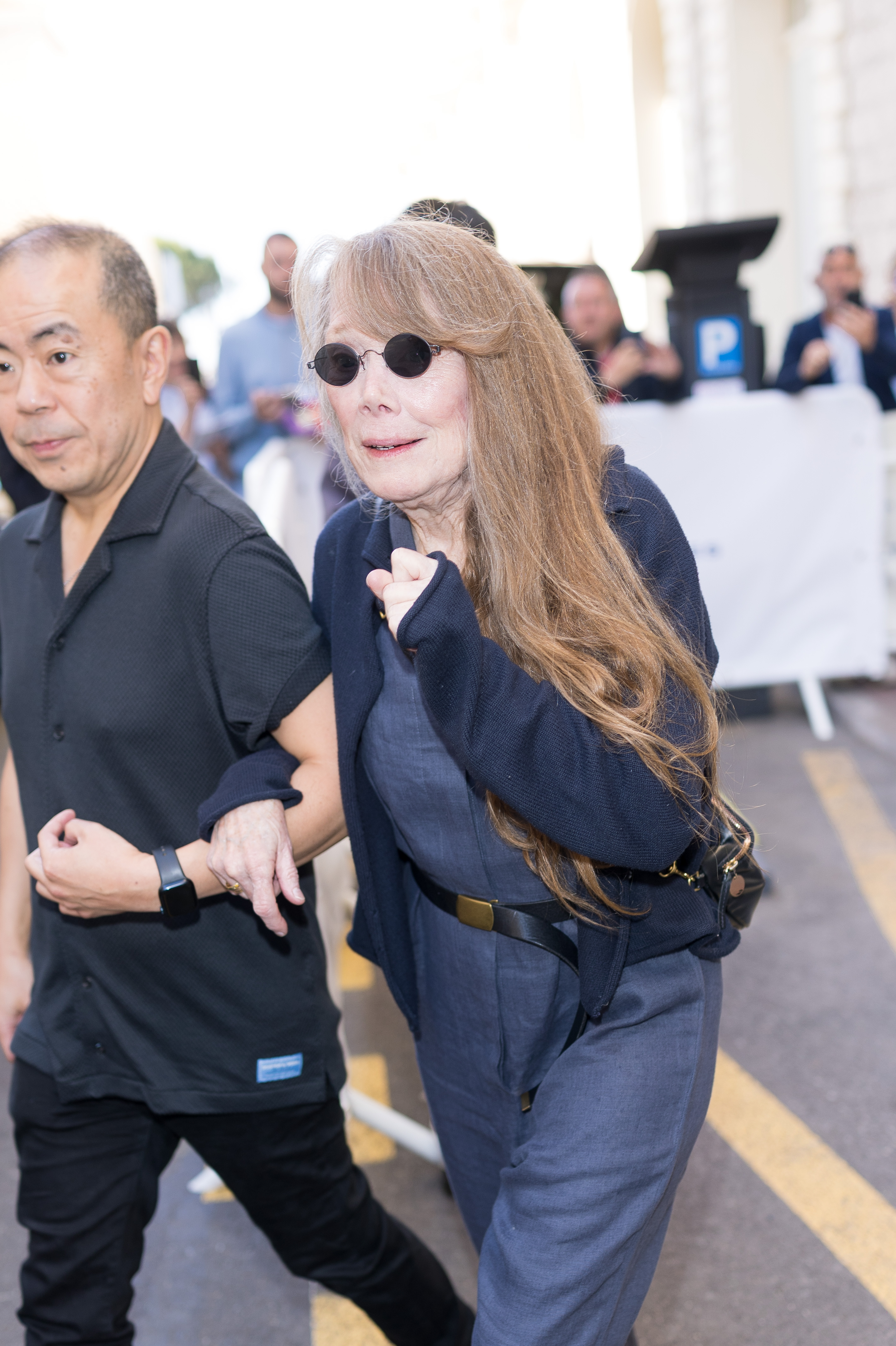 Sissy Spacek walking with someone as she leaves Hotel Carlton. | Source: Getty Images