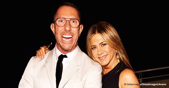 Jennifer Aniston poses topless in a rare photo while hugging her tattooed friend as she turns 50