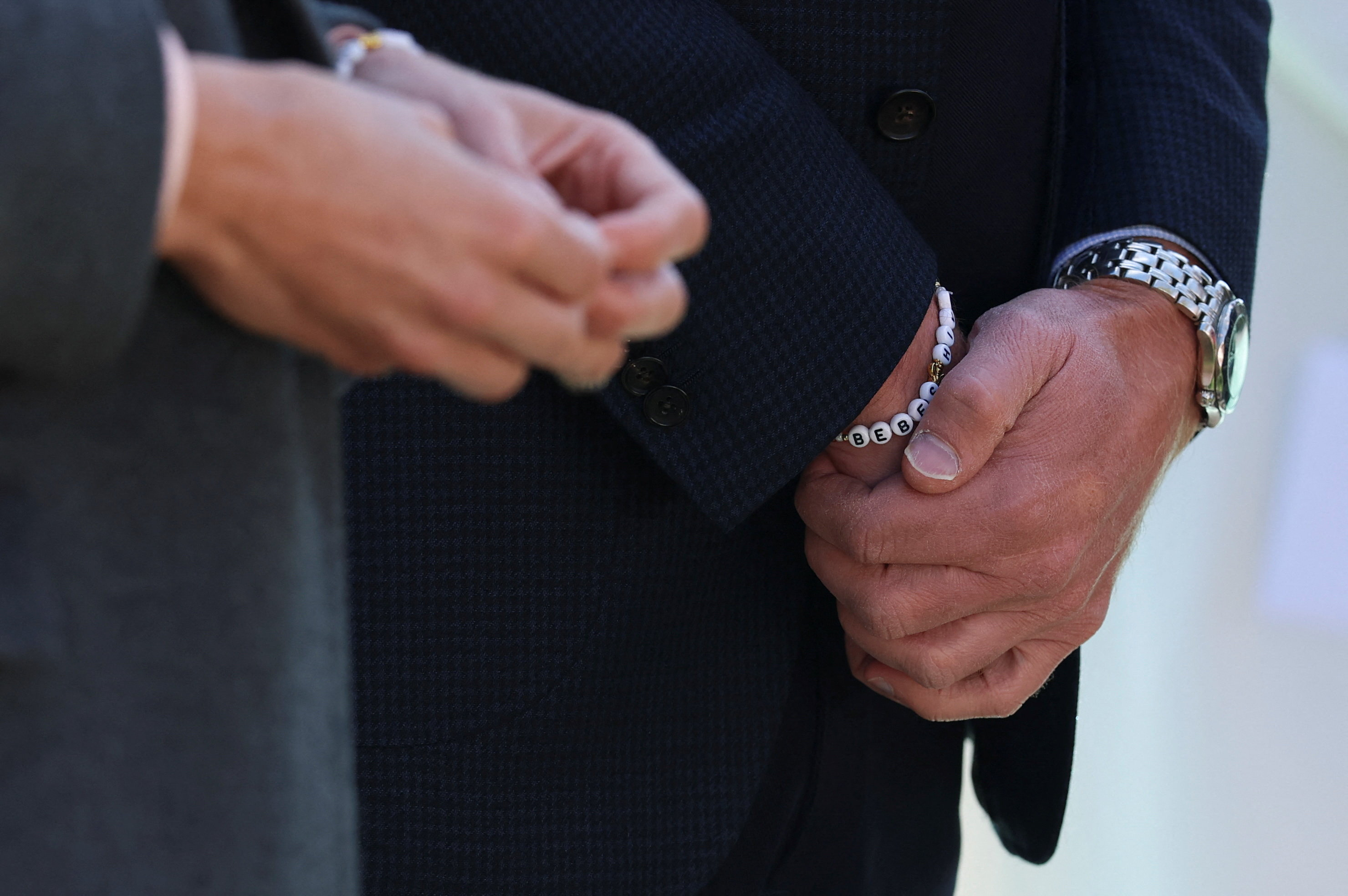 Prince William wears a bracelet with Bebe's name on it during his visit to Southport, England, on September 23, 2025 | Source: Getty Images