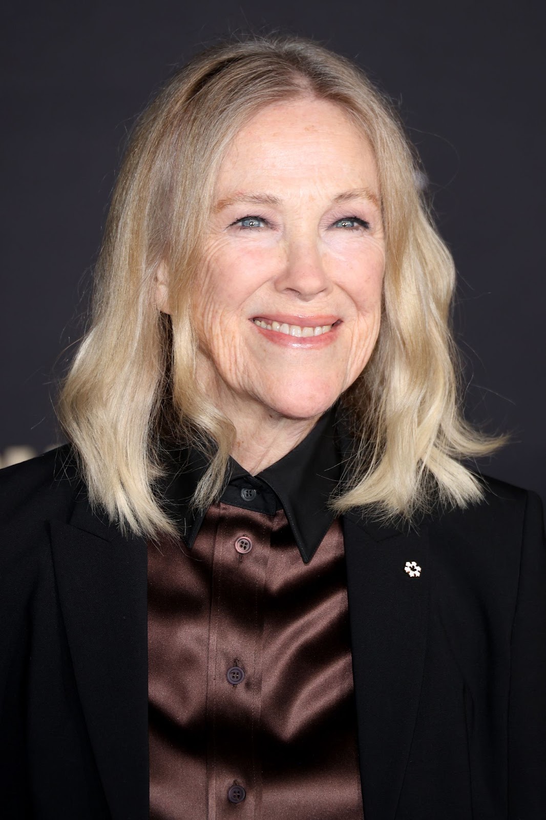 Catherine O'Hara at the premiere of "Road Diary: Bruce Springsteen & The E Street Band" on October 21, 2024, in Los Angeles, California. Now 70, O'Hara remains an admired figure in Hollywood, known for her roles in iconic films and her Emmy-winning turn on "Schitt's Creek." | Source: Getty Images