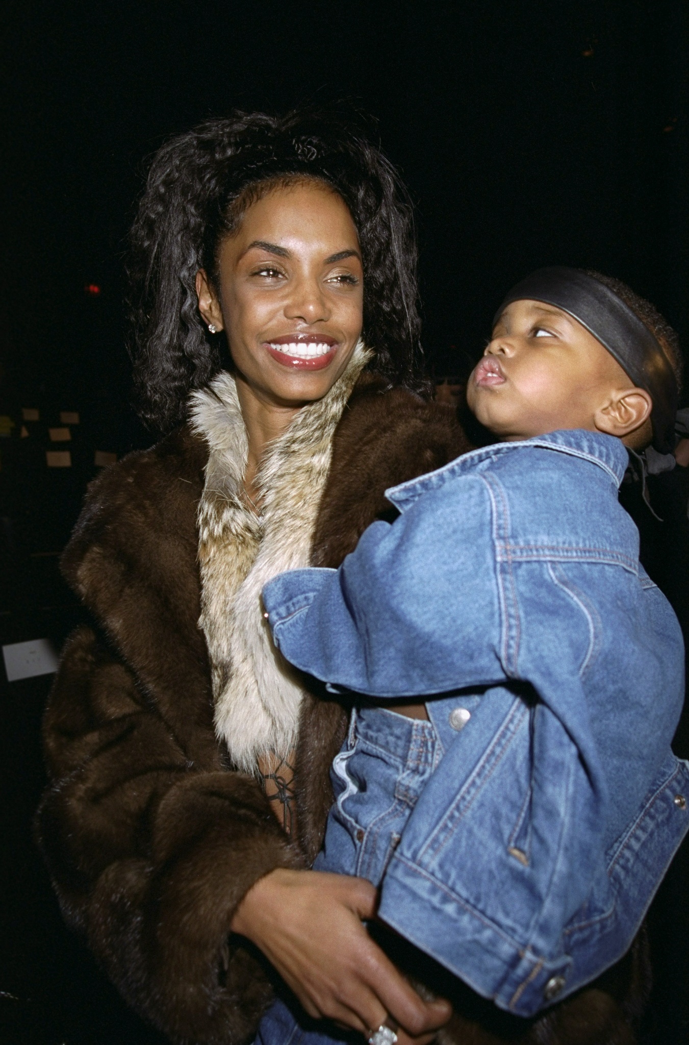 Kimberly Porter and Christian Combs at the Sean John fashion show on January 1, 2000, in Bryant Park, New York. | Source: Getty Images