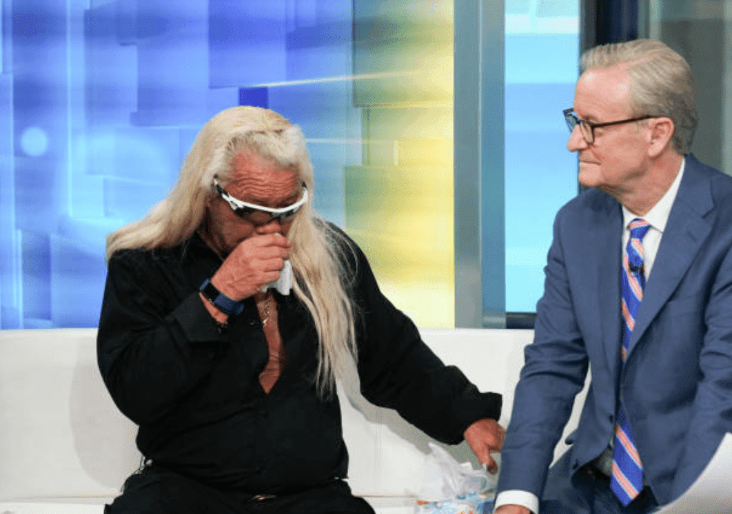 Duane Chapman wipes away tears as he sits down for an interview on "FOX & Friends" on August 28, 2019, New York City | Source: Bennett Raglin/Getty Images