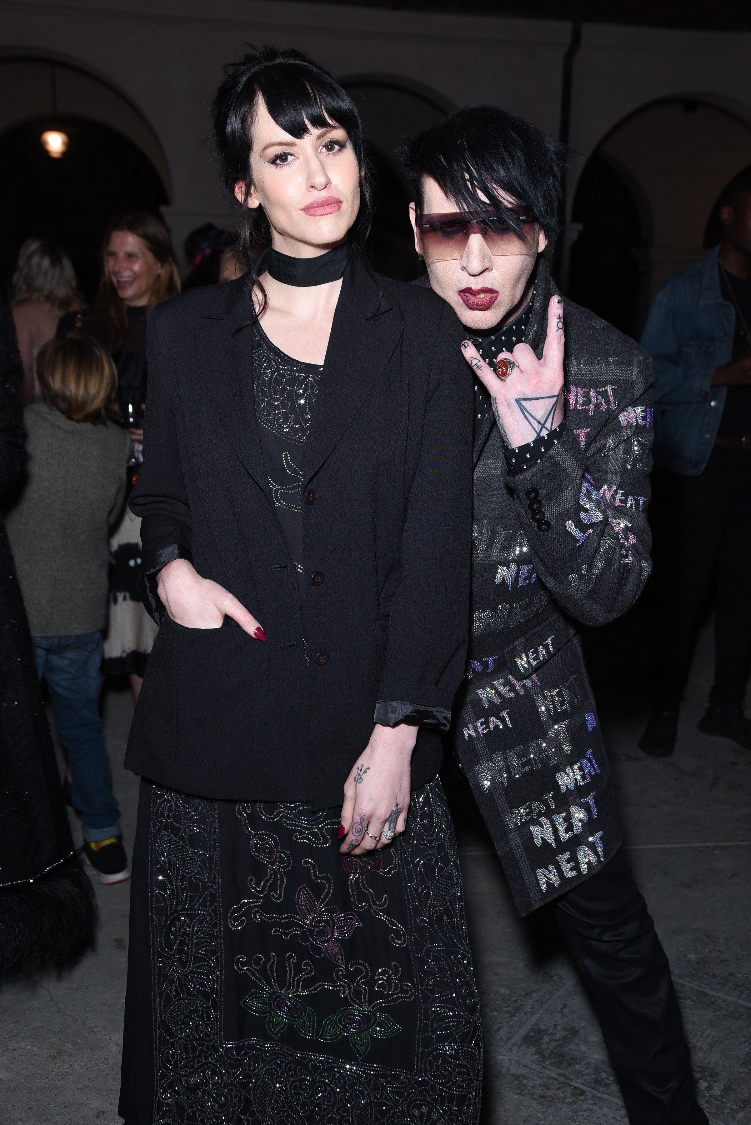 Lindsay Usich and Marilyn Manson during the Libertine Fall 2019 Runway Show at Ebell of Los Angeles on April 26, 2019 in Los Angeles, California | Source: Getty Images