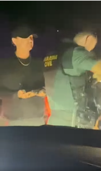 Leonardo DiCaprio stands beside a police officer from Spain's Guardia Civil during a search, from a video post dated August 13, 2025 | Source: Facebook/elEconomista.es