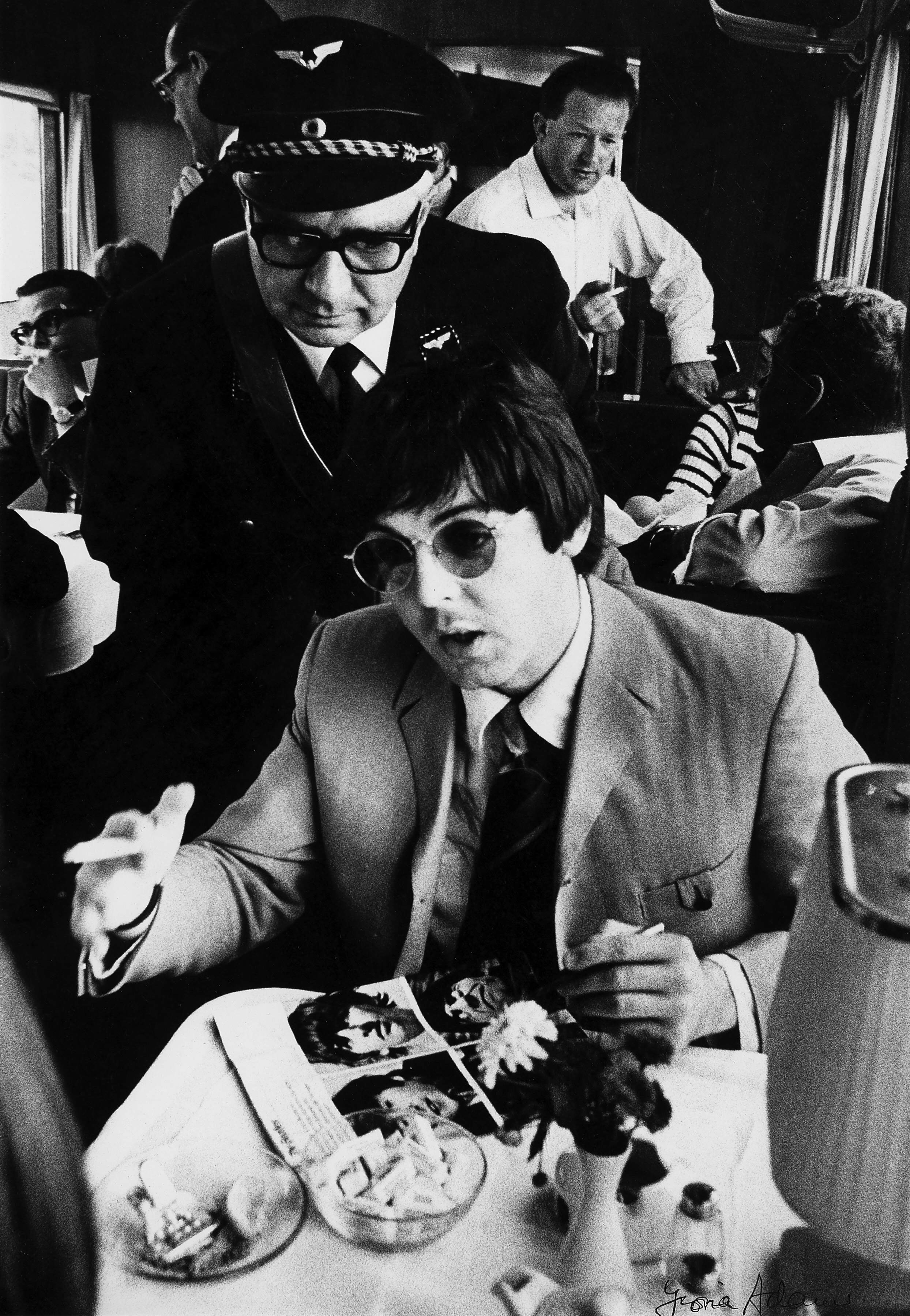 Paul McCartney and (Tony Barrow in background), on the Germany tour on a train between Munich and Hamburg in June 1966. | Source: Getty Images