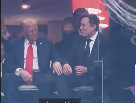 Donald Trump taps Elon Musk's knee as they talked during the public memorial service for Charlie Kirk at State Farm Stadium on September 21, 2025 | Source: Getty Images