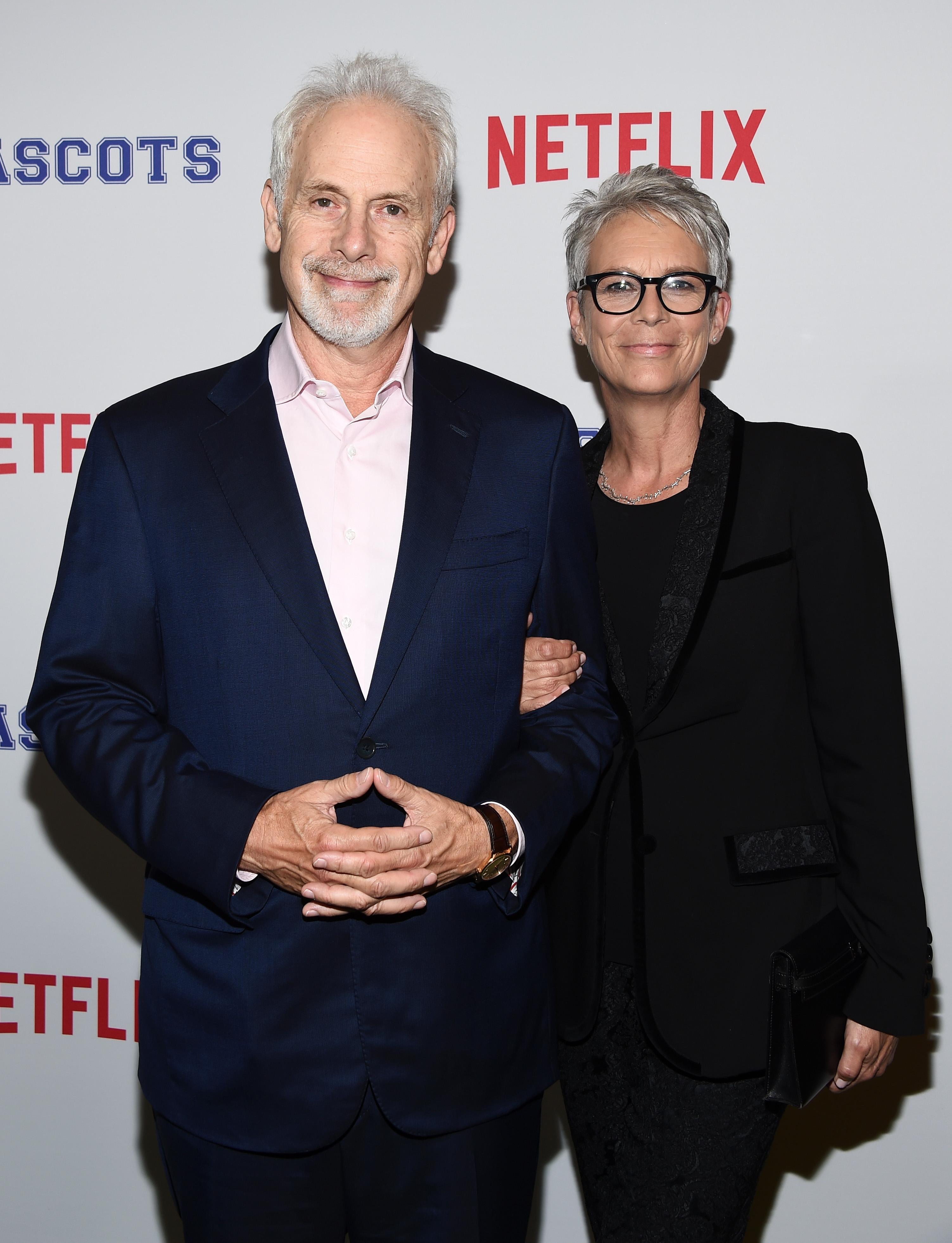 Christopher Guest and Jamie Lee Curtis arrive at a screening of Netflix's "Mascots" at the Linwood Dunn Theater in Los Angeles, California on October 5, 2016. | Source: Getty Images