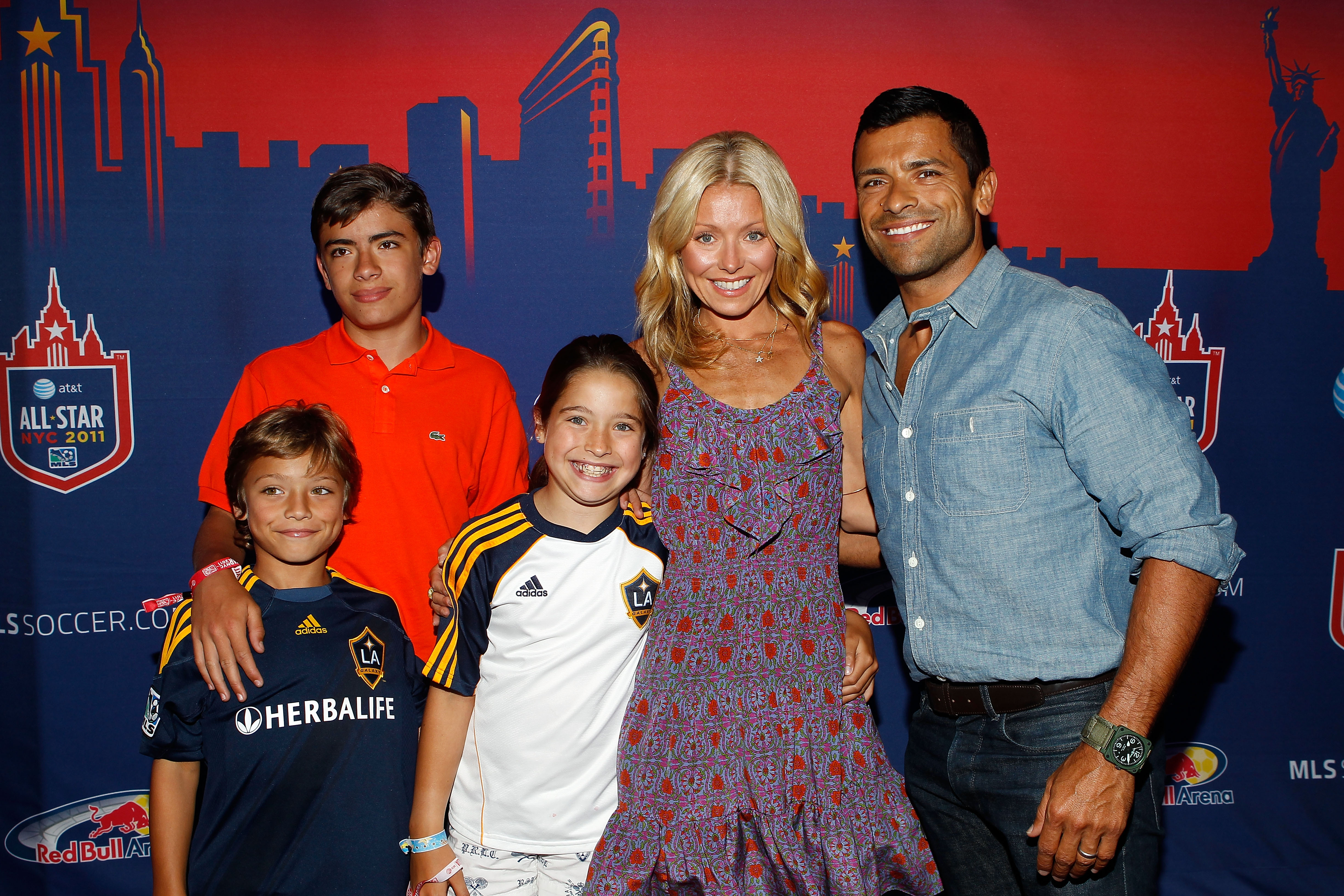 TV personality Kelly Ripa (2nd R), her husband Mark Consuelos (R) and their kids smiles for a photo prior to the MLS All-Star Game at Red Bull Arena on July 27, 2011 in Harrison, New Jersey | Source: Getty Images